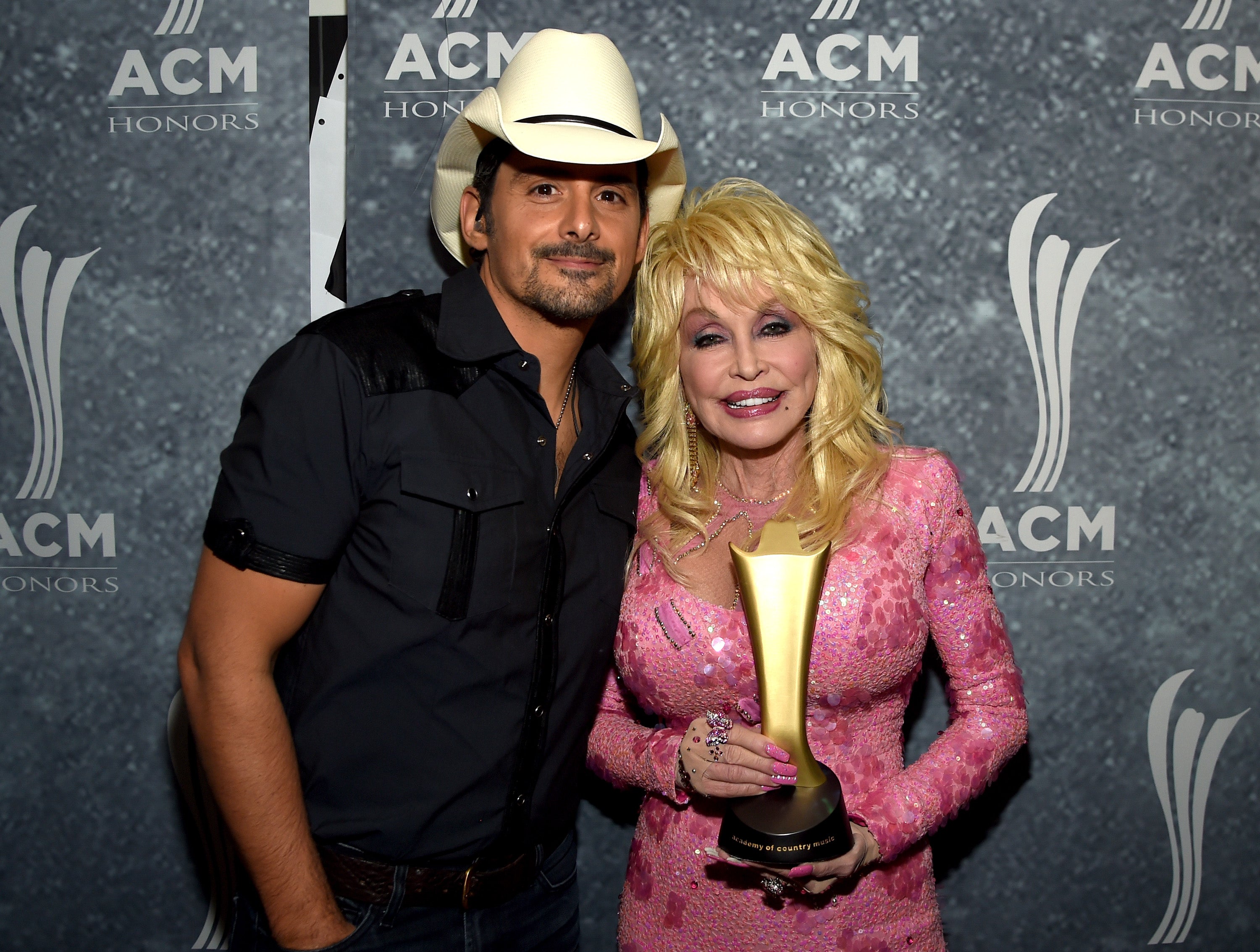 Brad Paisley performs heart-wrenching Dolly Parton duet alone after her death