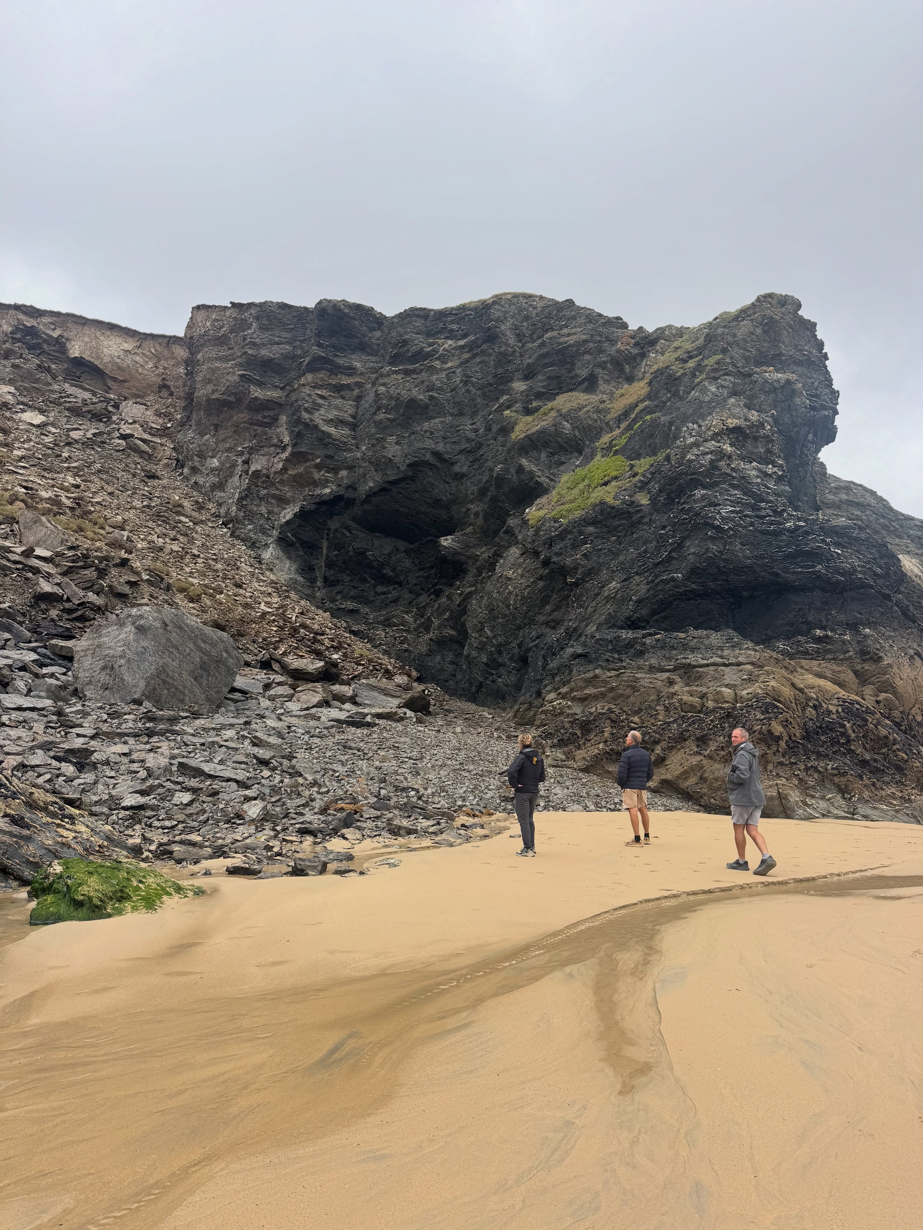 Residents and tourists have been urged to stay away from the cliff fall at Holywell Cave on Holywell Bay