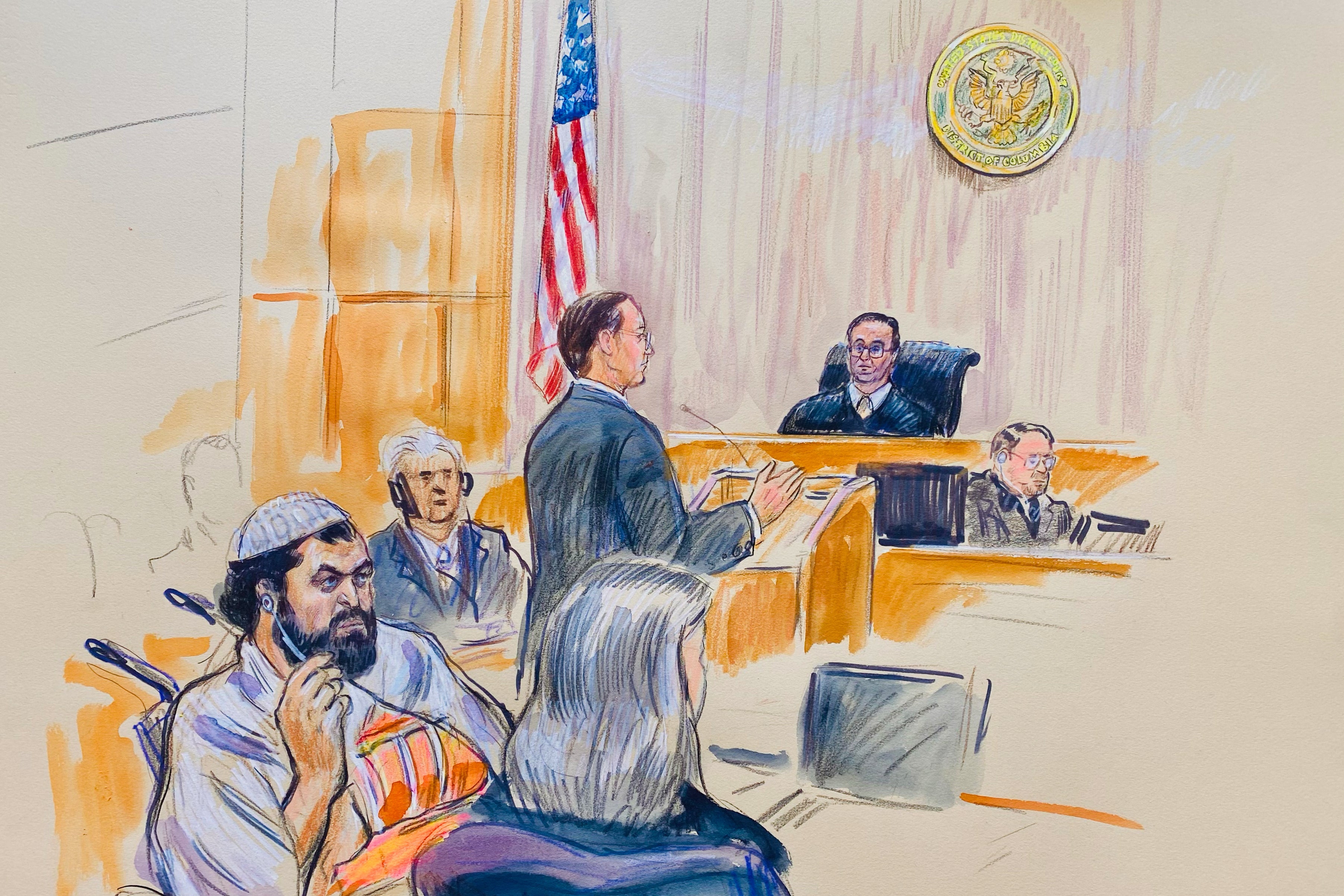 A courtroom sketch shows Rahmanullah Lakanwal, 29, seated left