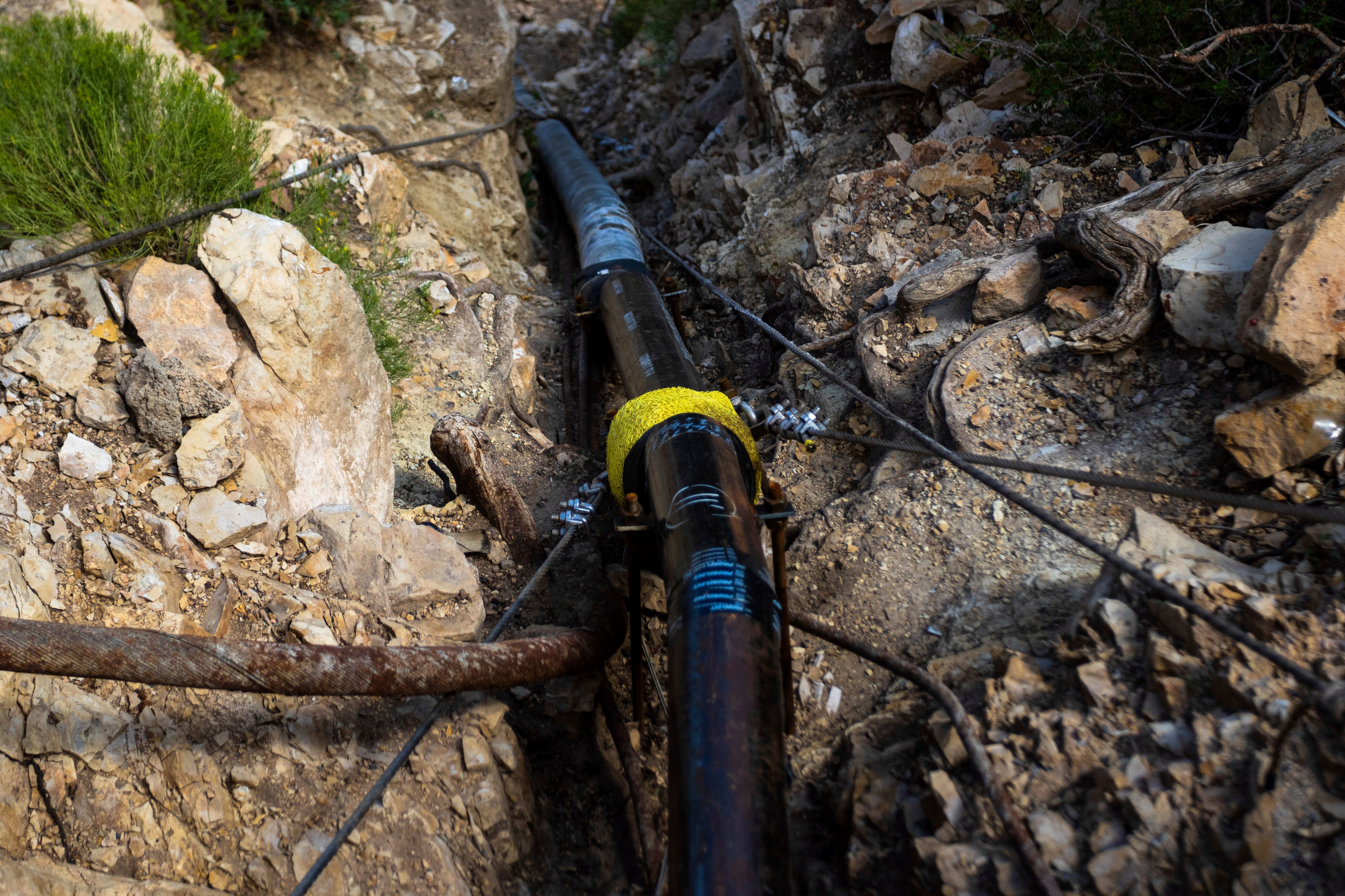 Flash floods damage Grand Canyon's critical water pipeline, forcing park closures and water conservation as more flooding possible Monday