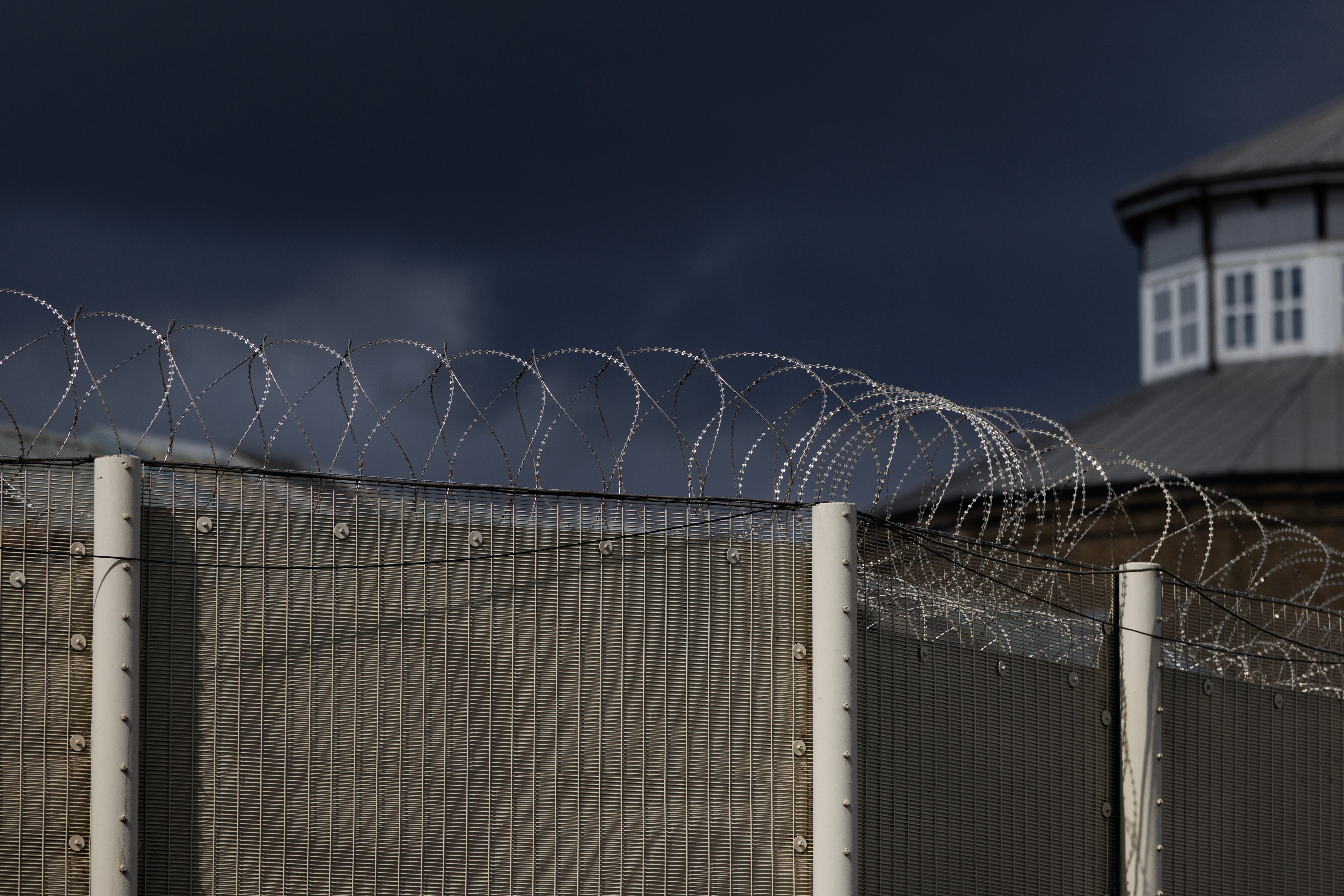 Justice secretary Alex Norris said 'hundreds of places' would be created by converting existing spaces inside prisons into accommodation (Getty)