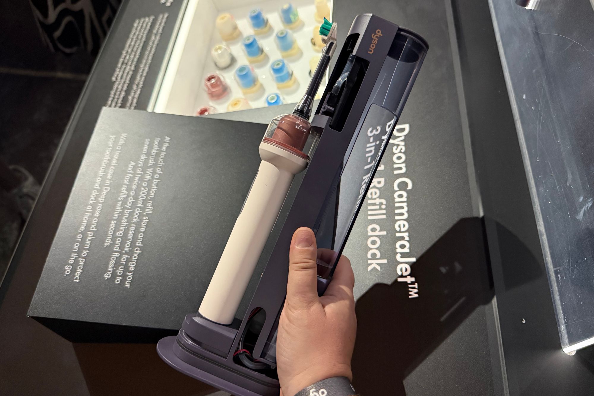 The charging dock has the ability to fill up your brush's on-handle mouthwash tank at the touch of a button