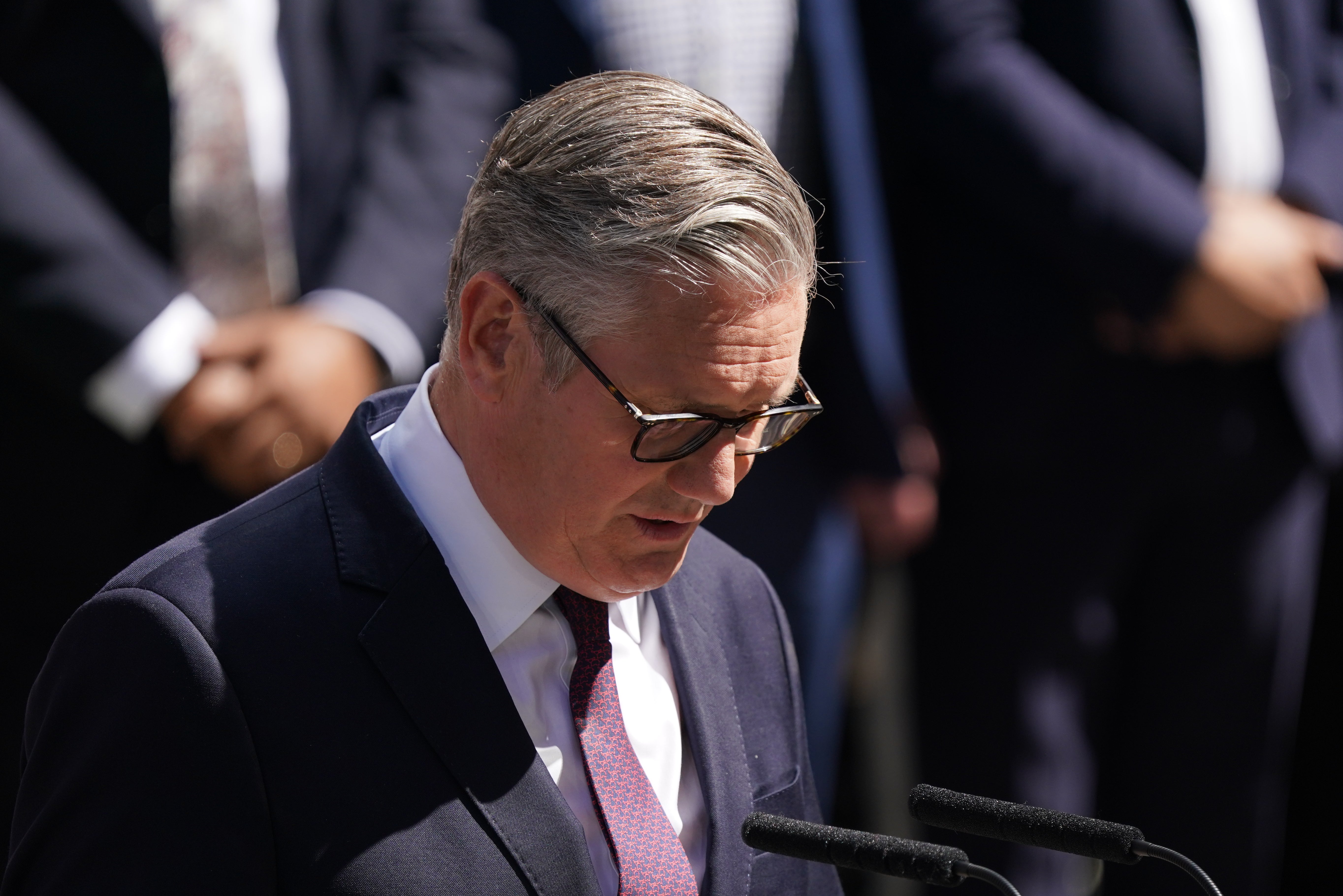 Keir Starmer delivers a statement outside 10 Downing Street ahead of the arrival of new Prime Minister Andy Burnham in July