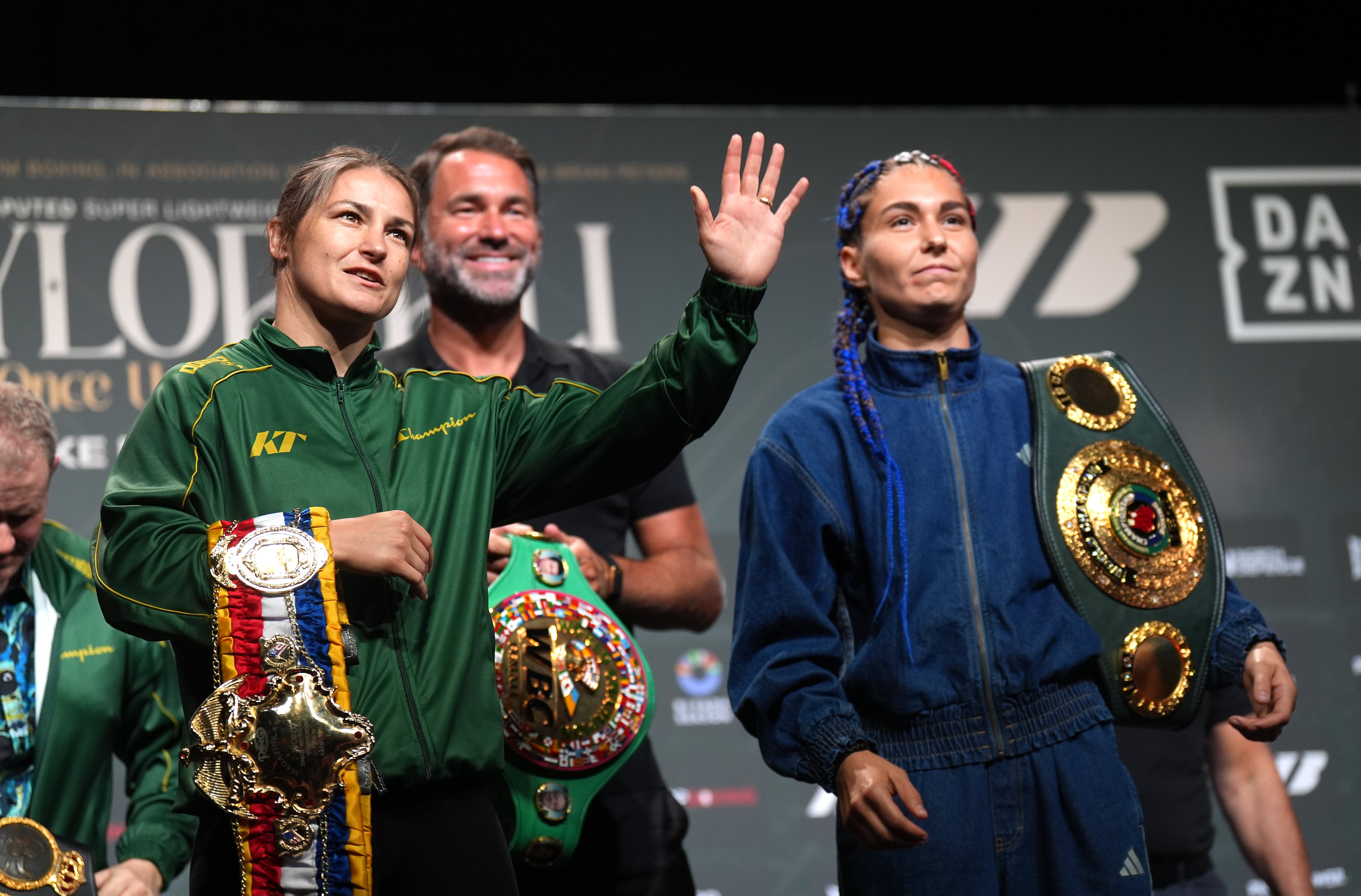 Katie Taylor, left, and Flora Pili, right, face off (Niall Carson/PA)