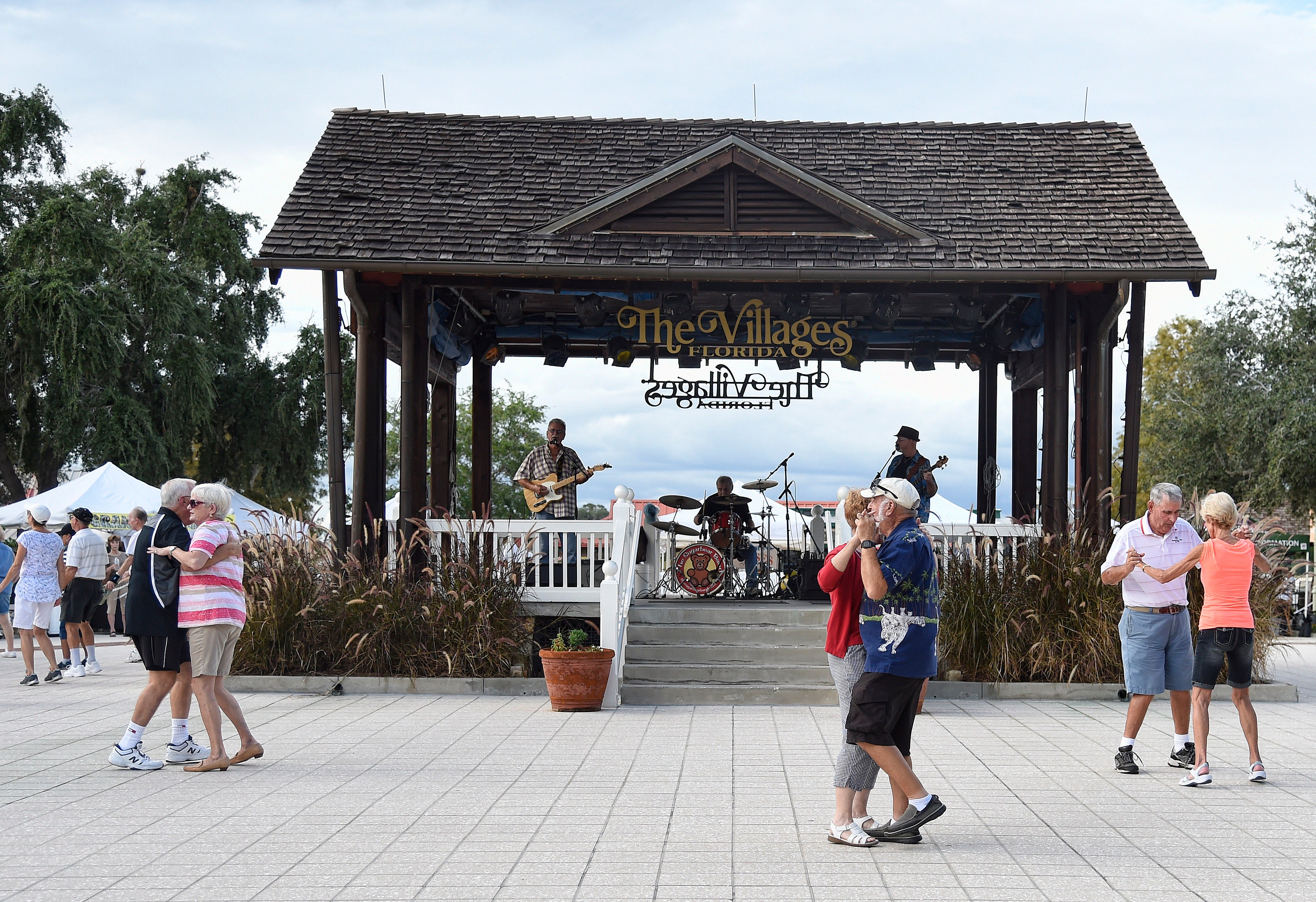 Residents of The Villages, Florida dancing during a party. The Villages is the world's largest retirement community and is just south of Wildwood, Florida