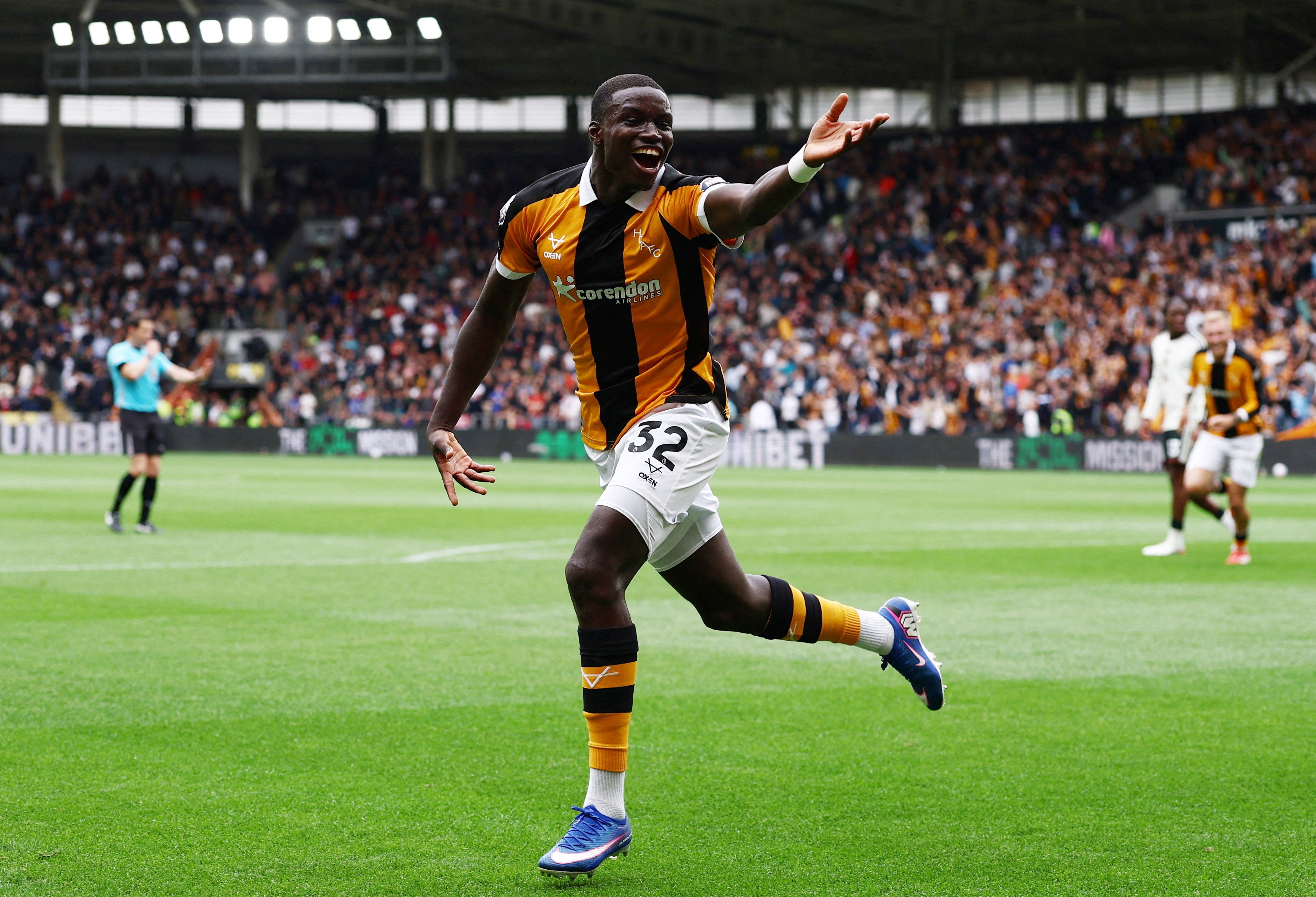 Nobel Mendy celebrates after scoring on his debut against Man Utd