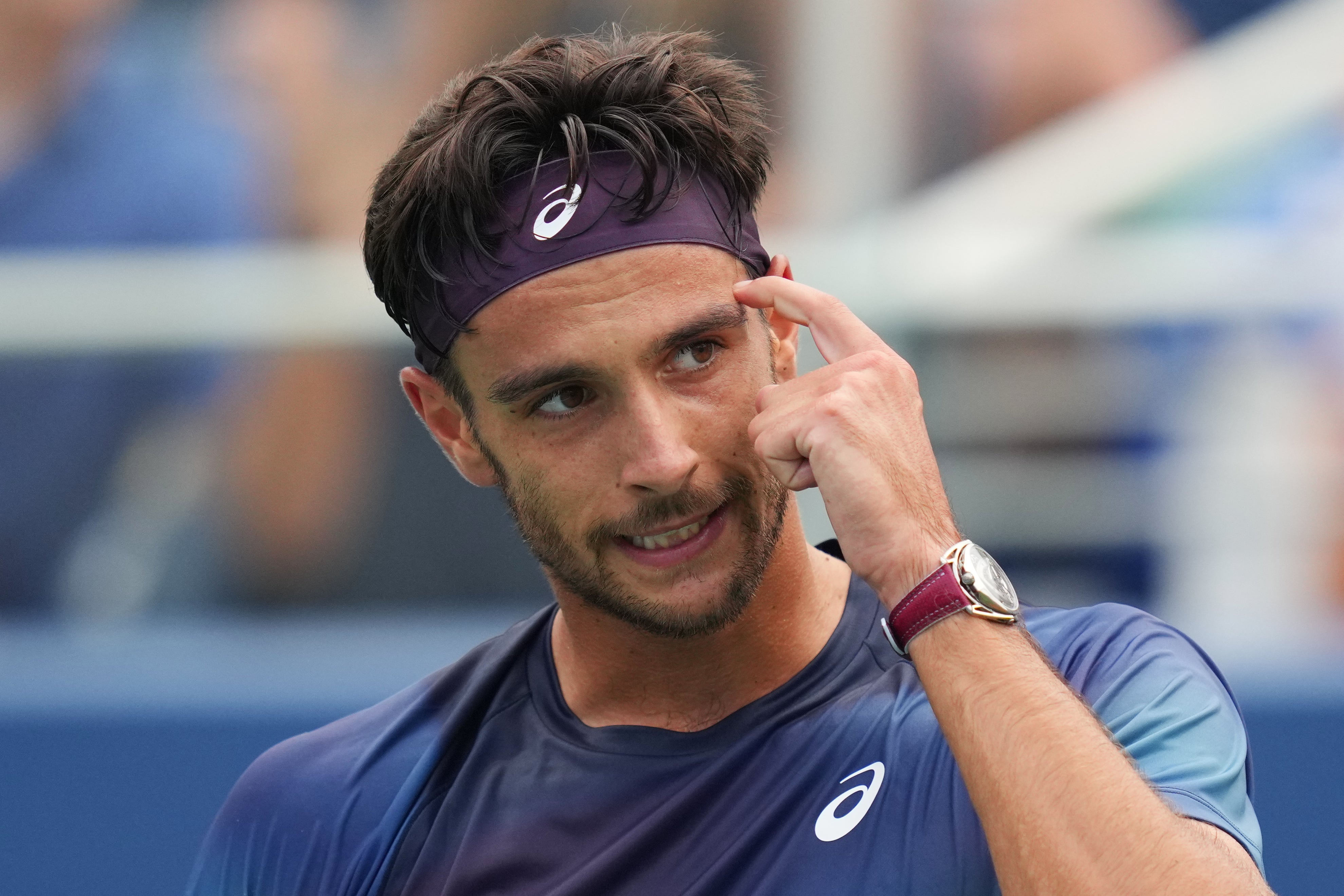 Lorenzo Musetti reacts during his first-round victory over Arthur Fery (Kirsty Wigglesworth/AP)