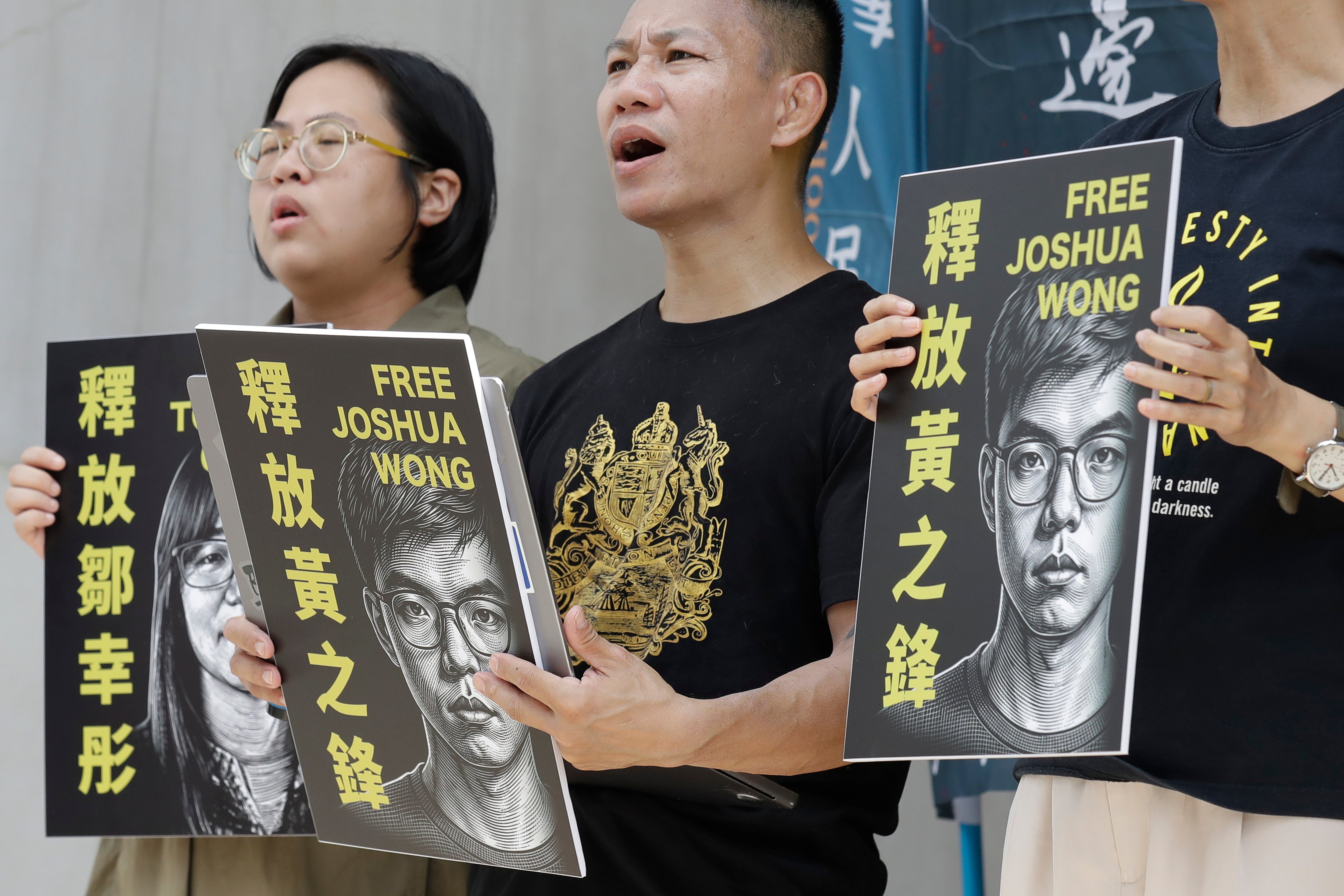 Hong Kong activist and supporters hold signs during a press event to support pro-democracy activist Joshua Wong in Taipei, Taiwan, Wednesday, 2 Sept 2026
