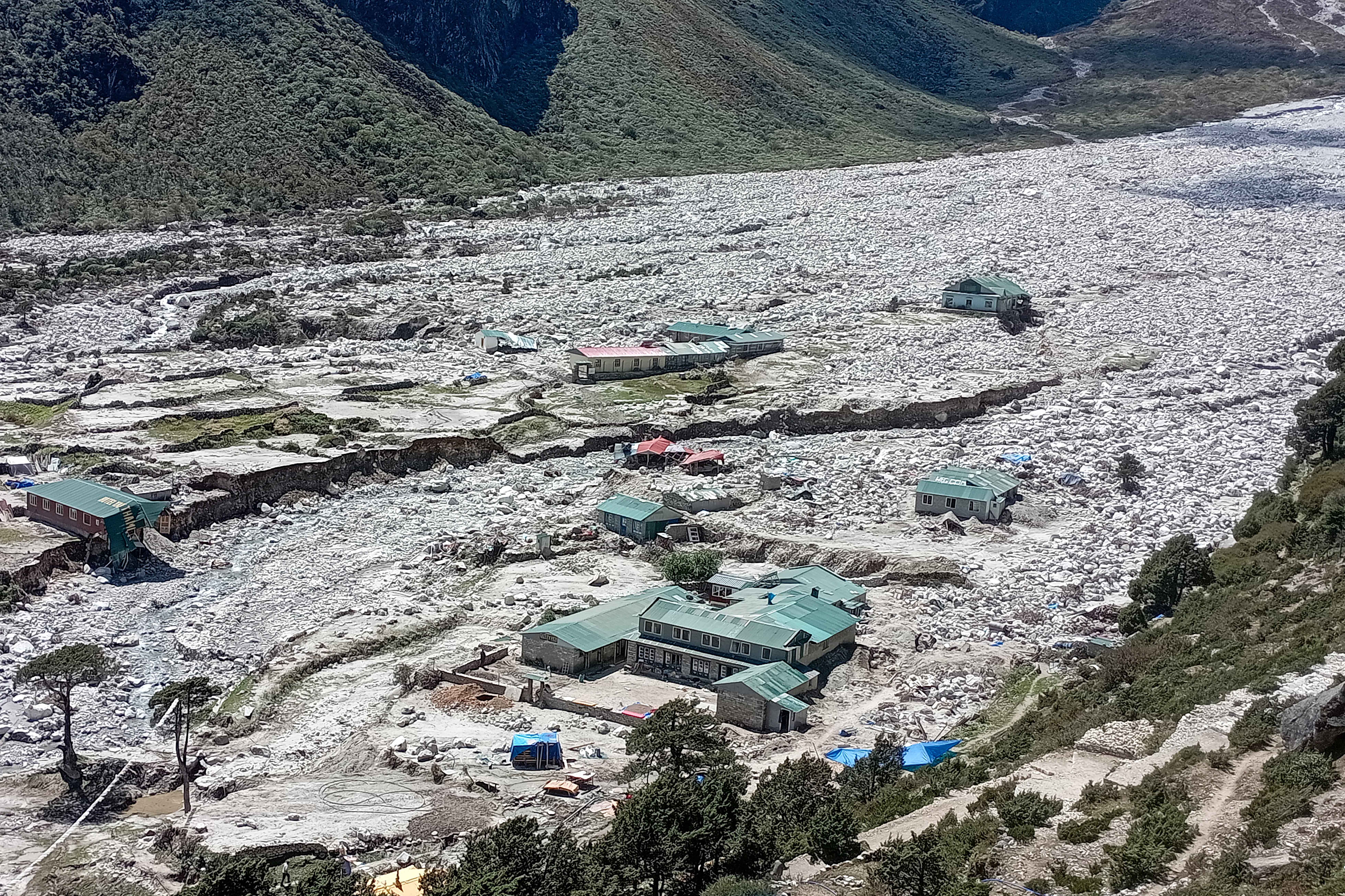 Houses lie abandoned in the aftermath of the flash floods at Thame village in Solukhumbu district of Nepal
