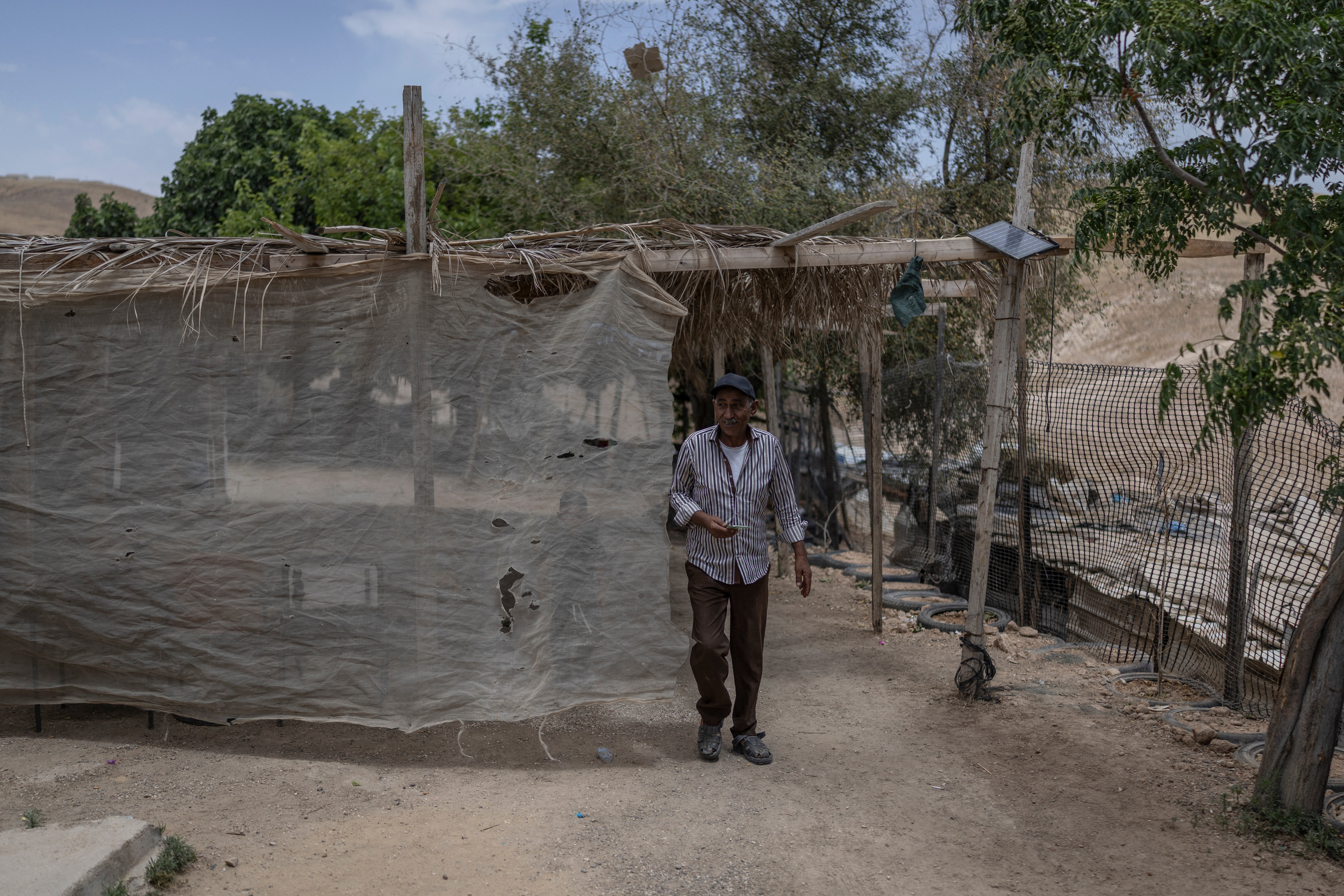A Palestinian Bedouin man walks in the Bedouin community of Khan al-Ahmar in the Israeli-occupied West Bank on May 20, 2026