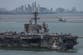 USS Lincoln docks with rusted metal and chipped paint after record-setting stint at sea