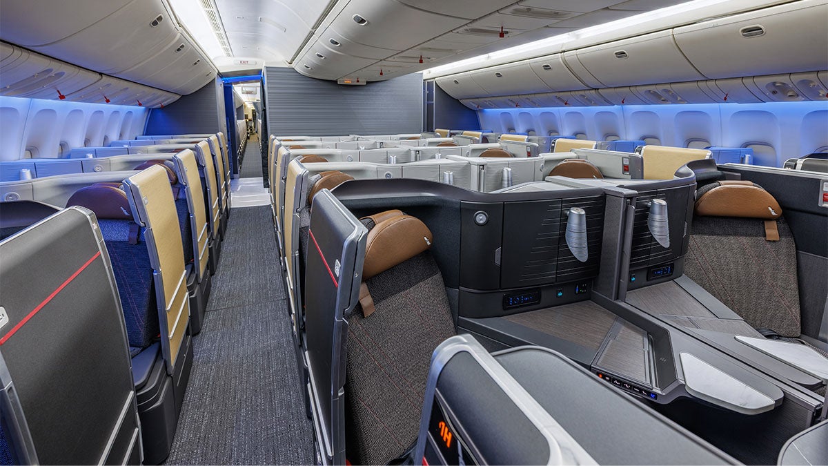 The revamped aircraft will feature 144 premium seats, up from 116 under the current layout, including 70 Flagship Suite business-class seats with privacy doors (pictured)