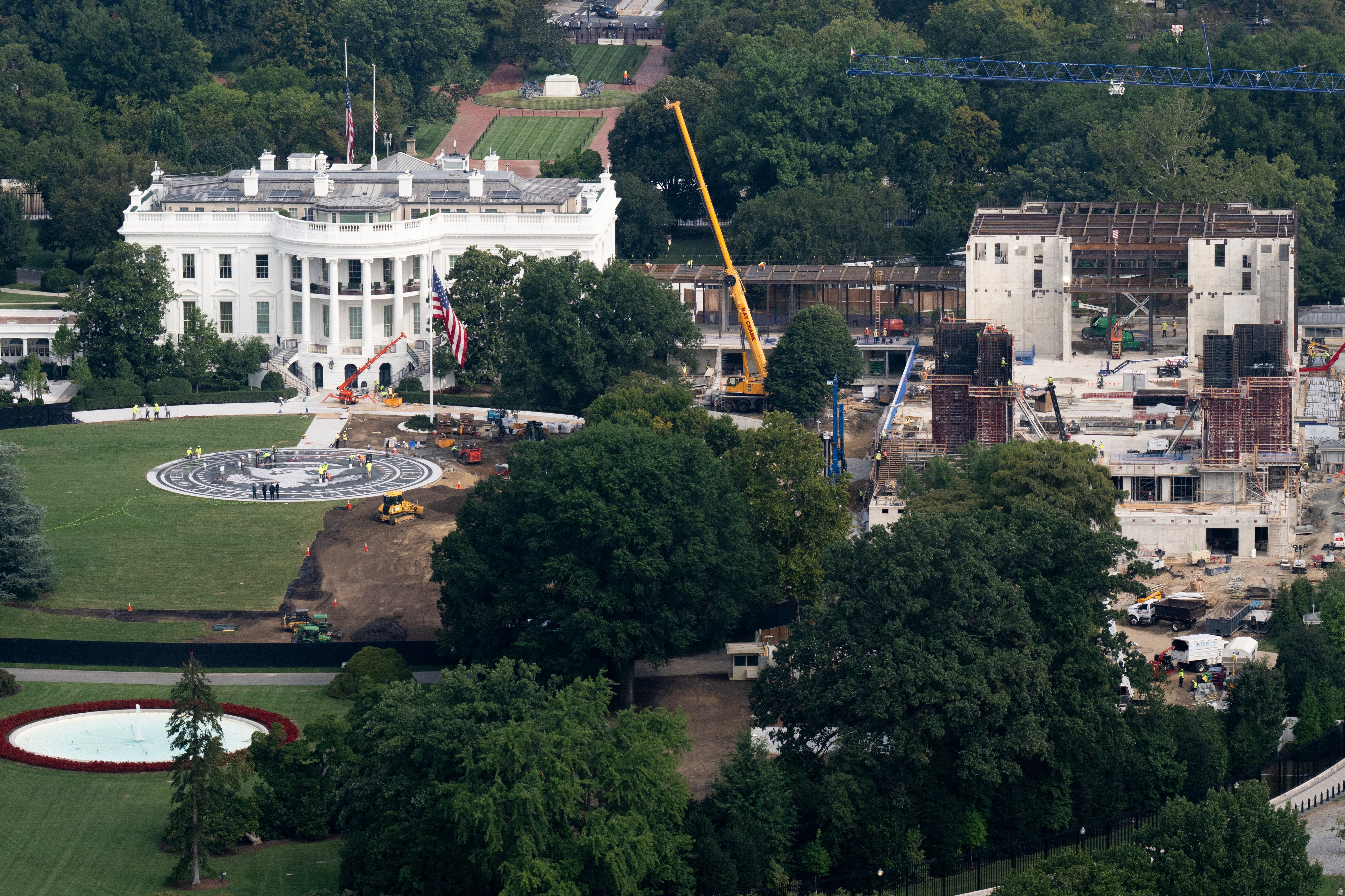 Trump says he hopes his name is on a sprawling ballroom and military installation that’s under construction on White House grounds where the administration had demolished the East Wing