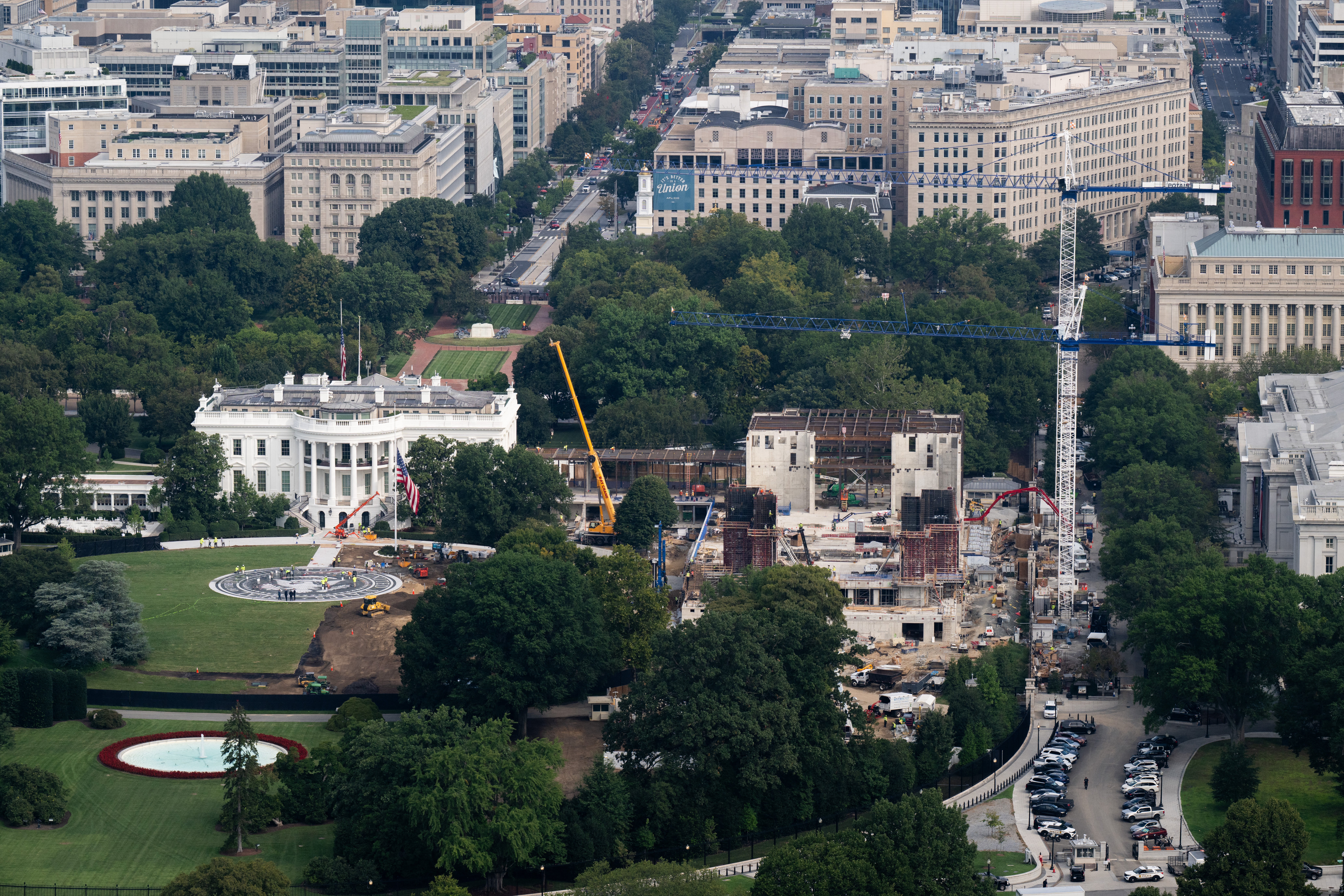 Construction continues on a new East Wing, including President Donald Trump's White House ballroom, as well as a new helipad for Marine One on the South Lawn, at the White House
