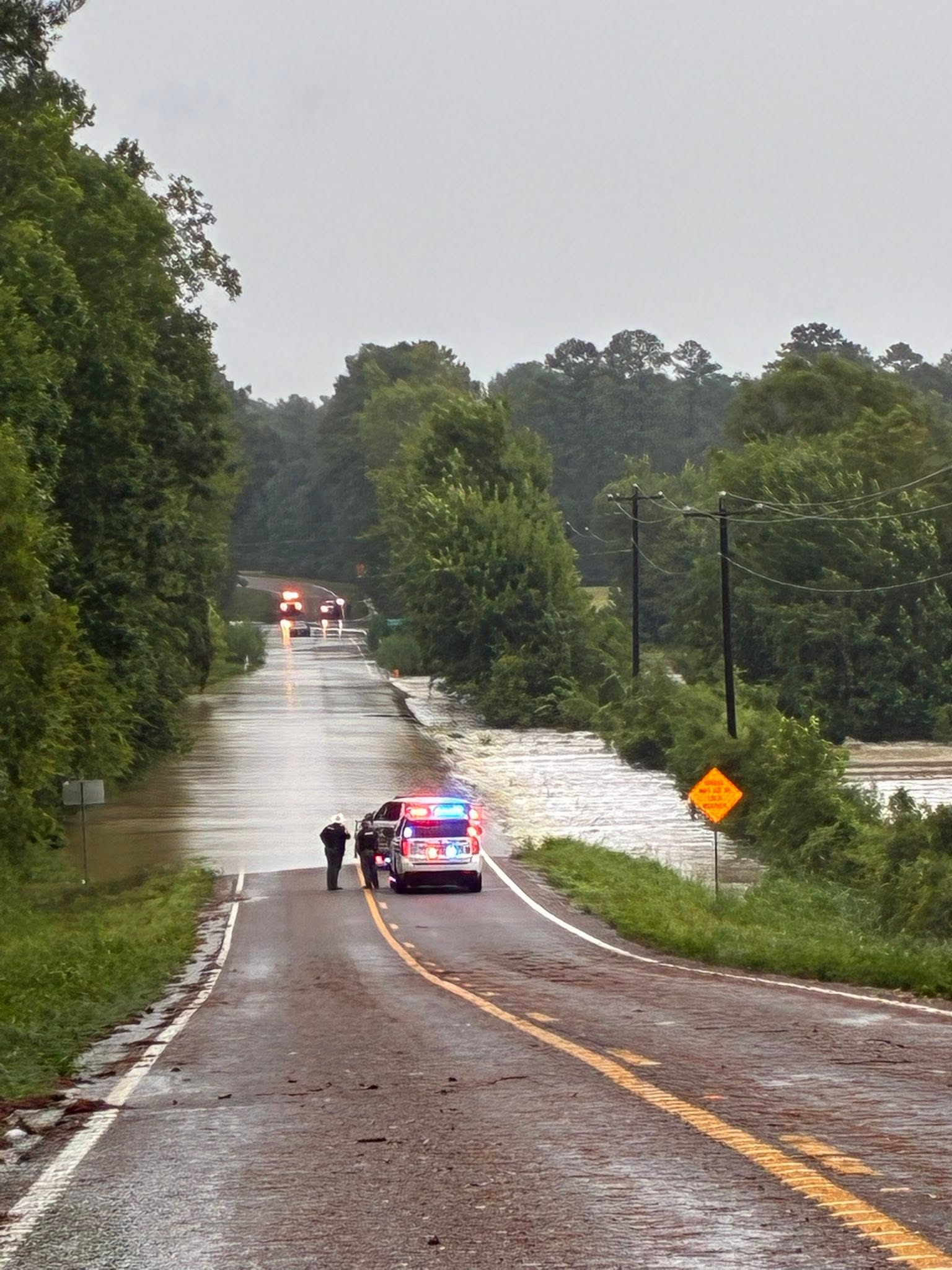Flooded roads around Hickman Creek are seen in this image from Polk County, Texas