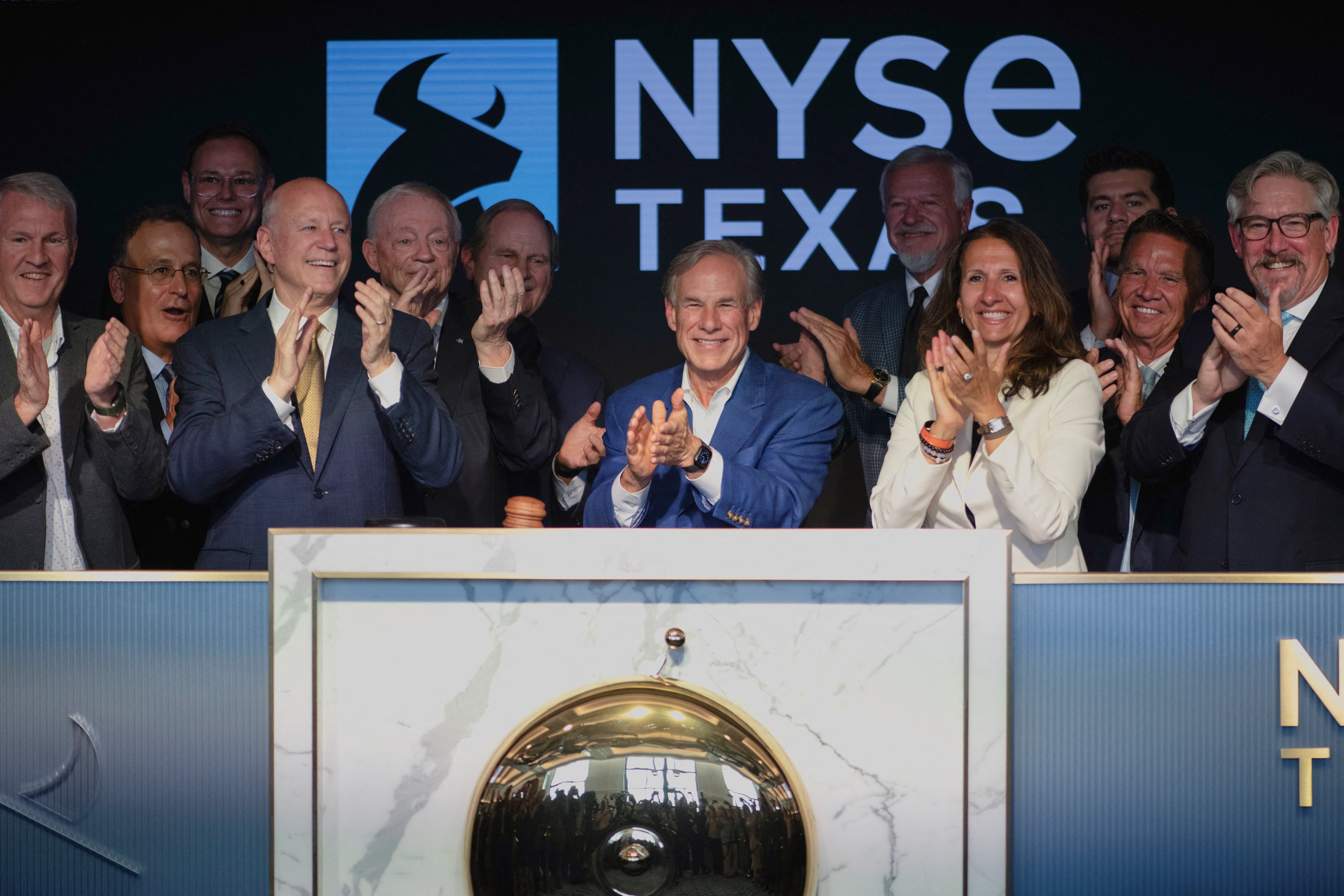 Data centers have emerged as an unlikely issue in the governor’s race in typically pro-business Texas, where Gov. Greg Abbott (center) has ordered a wide-ranging audit of ongoing projects