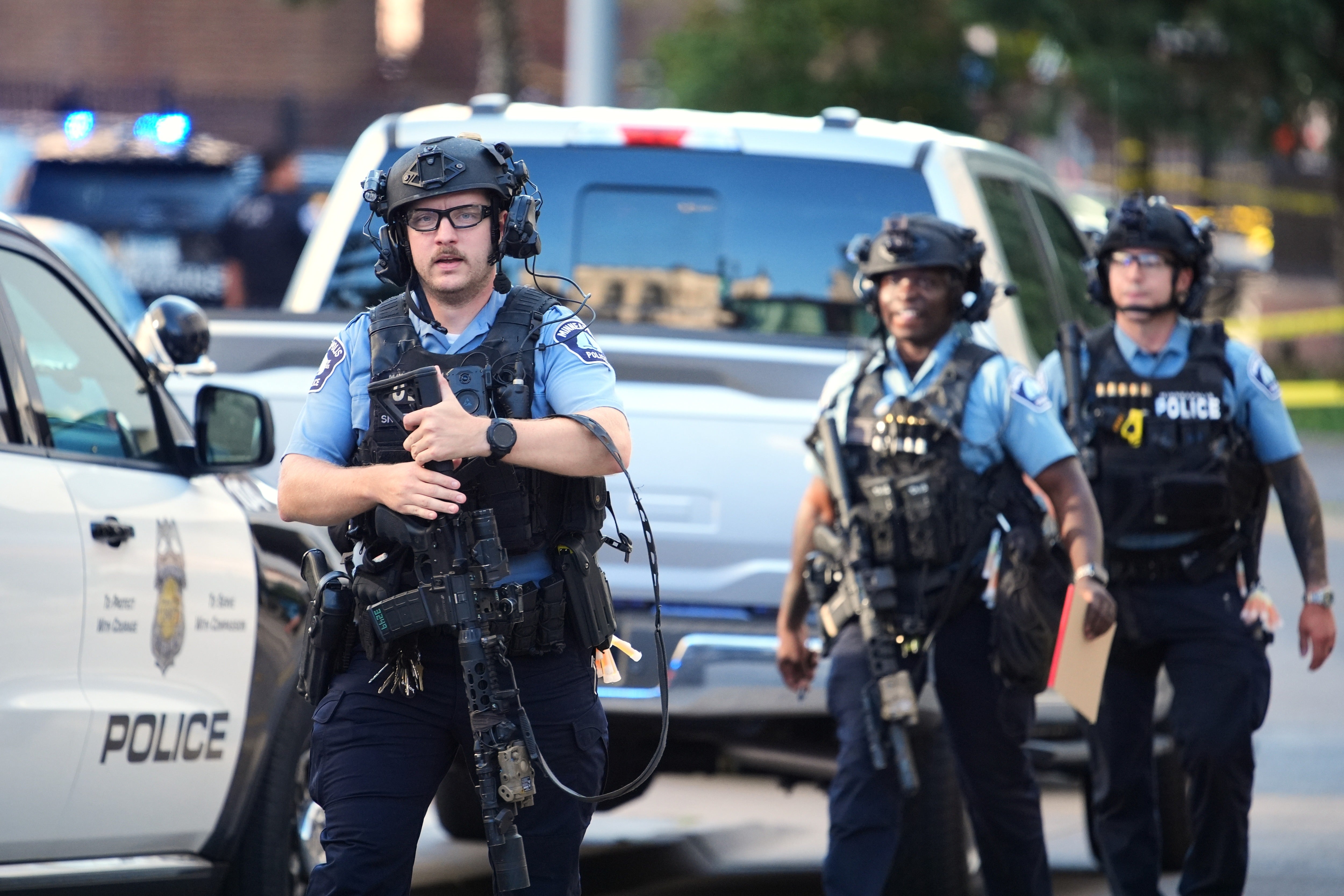 At least one person has been killed and another six injured in a shooting near a downtown Minneapolis apartment building