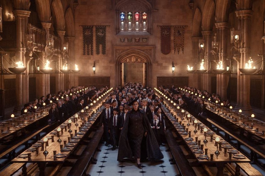 The official promotional footage opens with Janet McTeer appearing as Minerva McGonagall, informing gathered pupils that they must complete the sorting hat ceremony (PA)