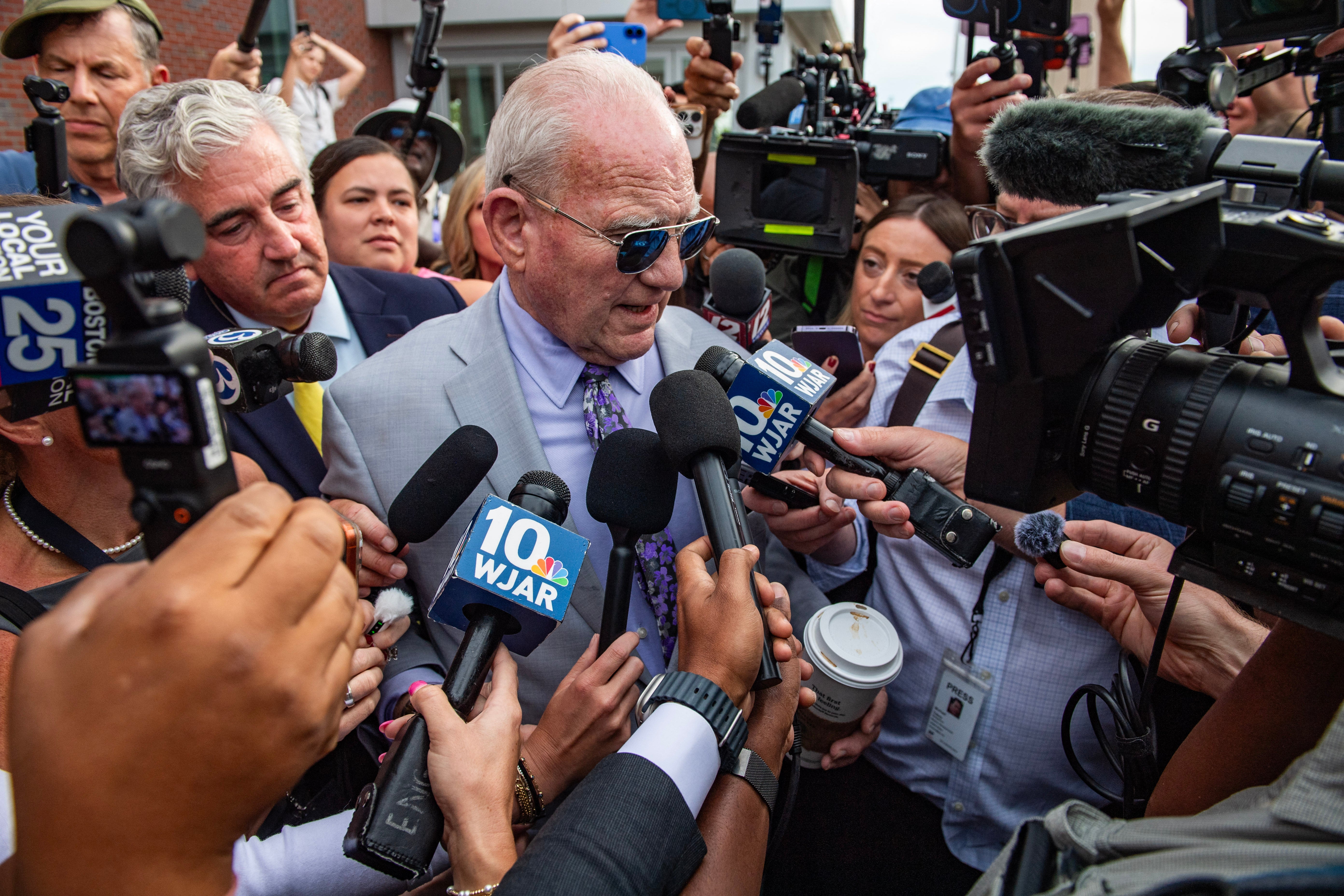 Clancy's defense attorney Kevin Reddington is surrounded by reporters while leaving the Plymouth Superior Court during the jury deliberation phase (AFP/Getty)