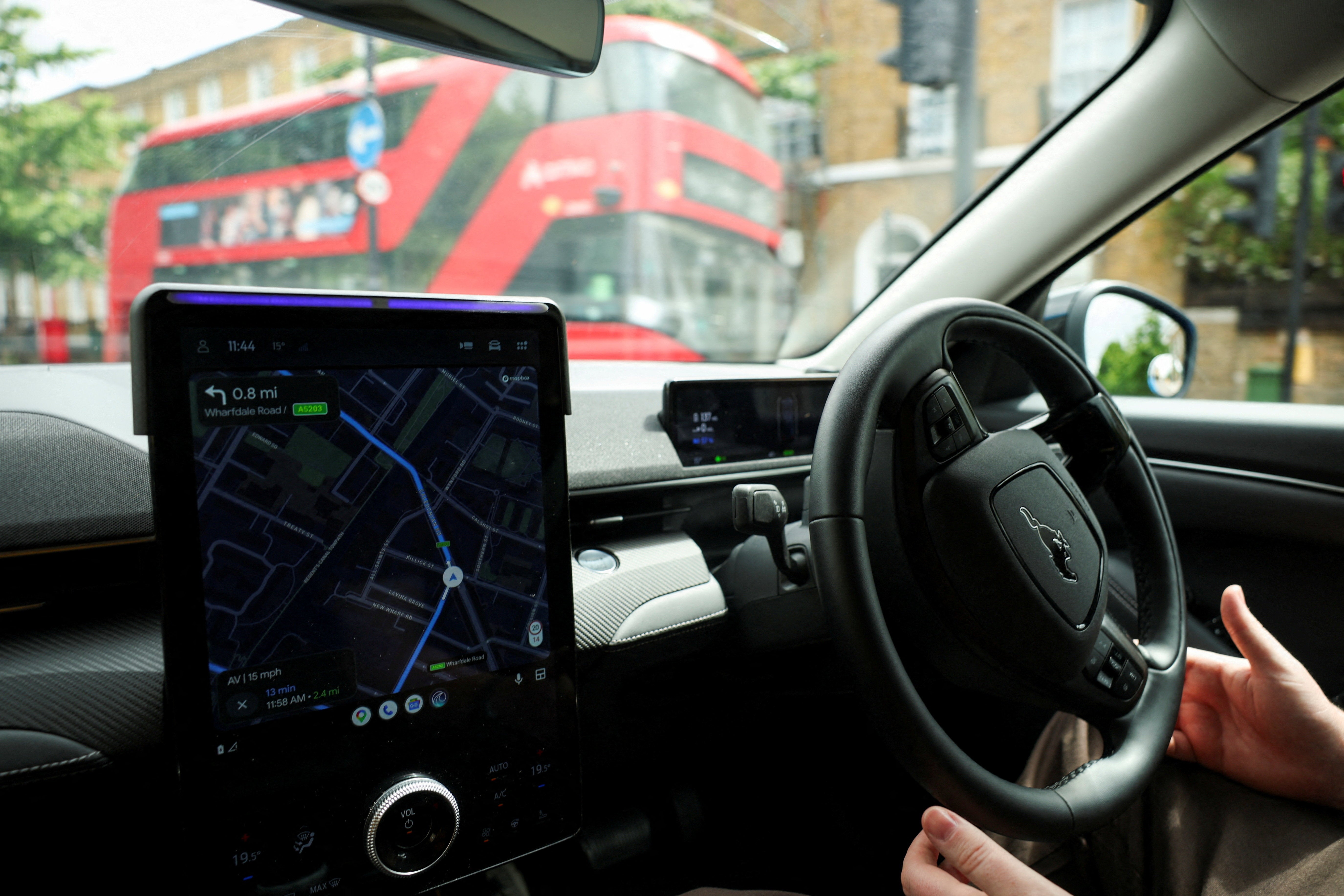 A Wayve autonomous car drives through a residential street during a technology demonstration as the self-driving start-up prepares to announce plans to launch autonomous rides on Uber, in London, Britain, June 5, 2026. REUTERS/Isabel Infantes/File Photo