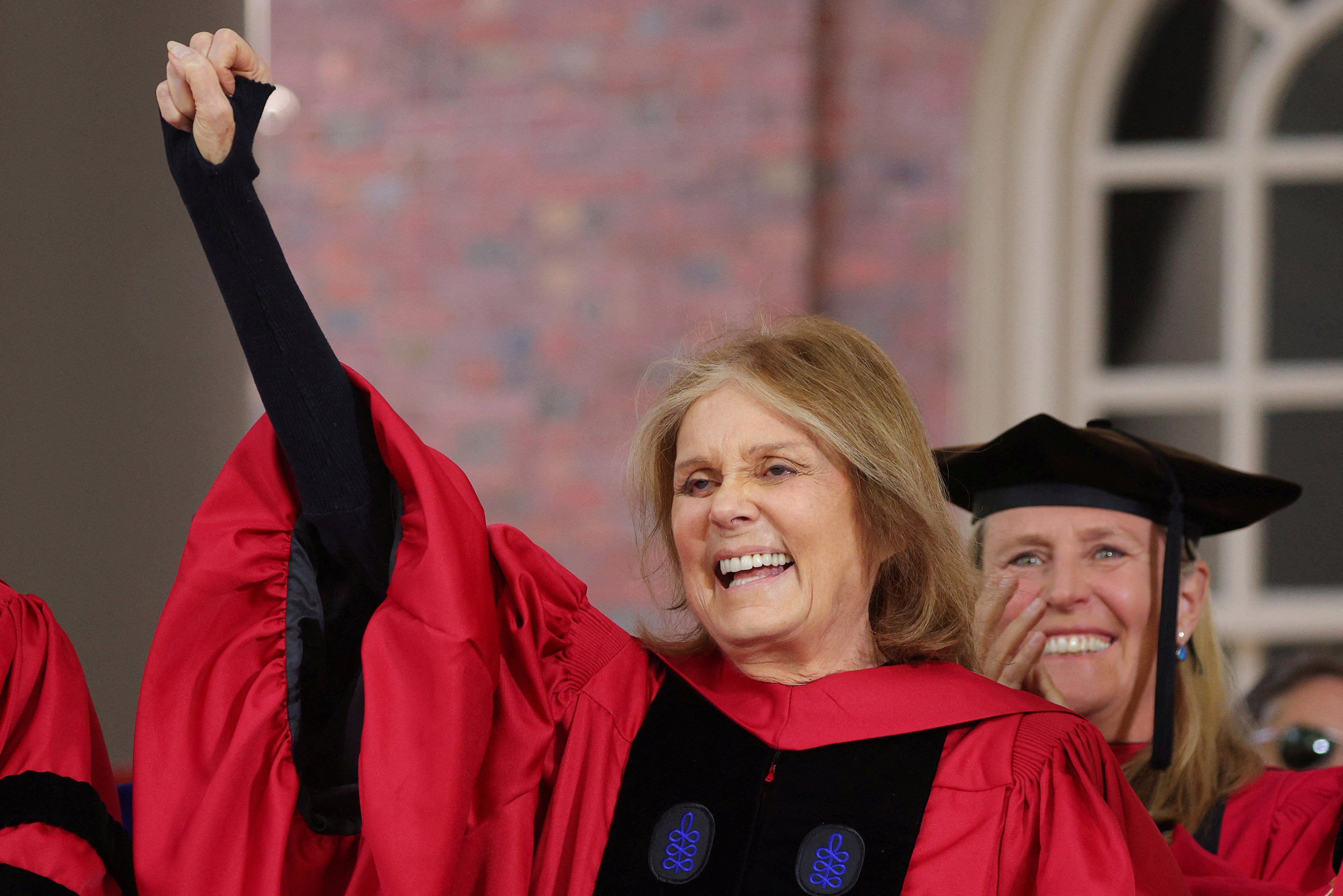 Steinem salutes the graduating students as she receives and honorary Doctor of Humane Letters during Harvard University's 371st Commencement Exercises in Cambridge, Massachusetts