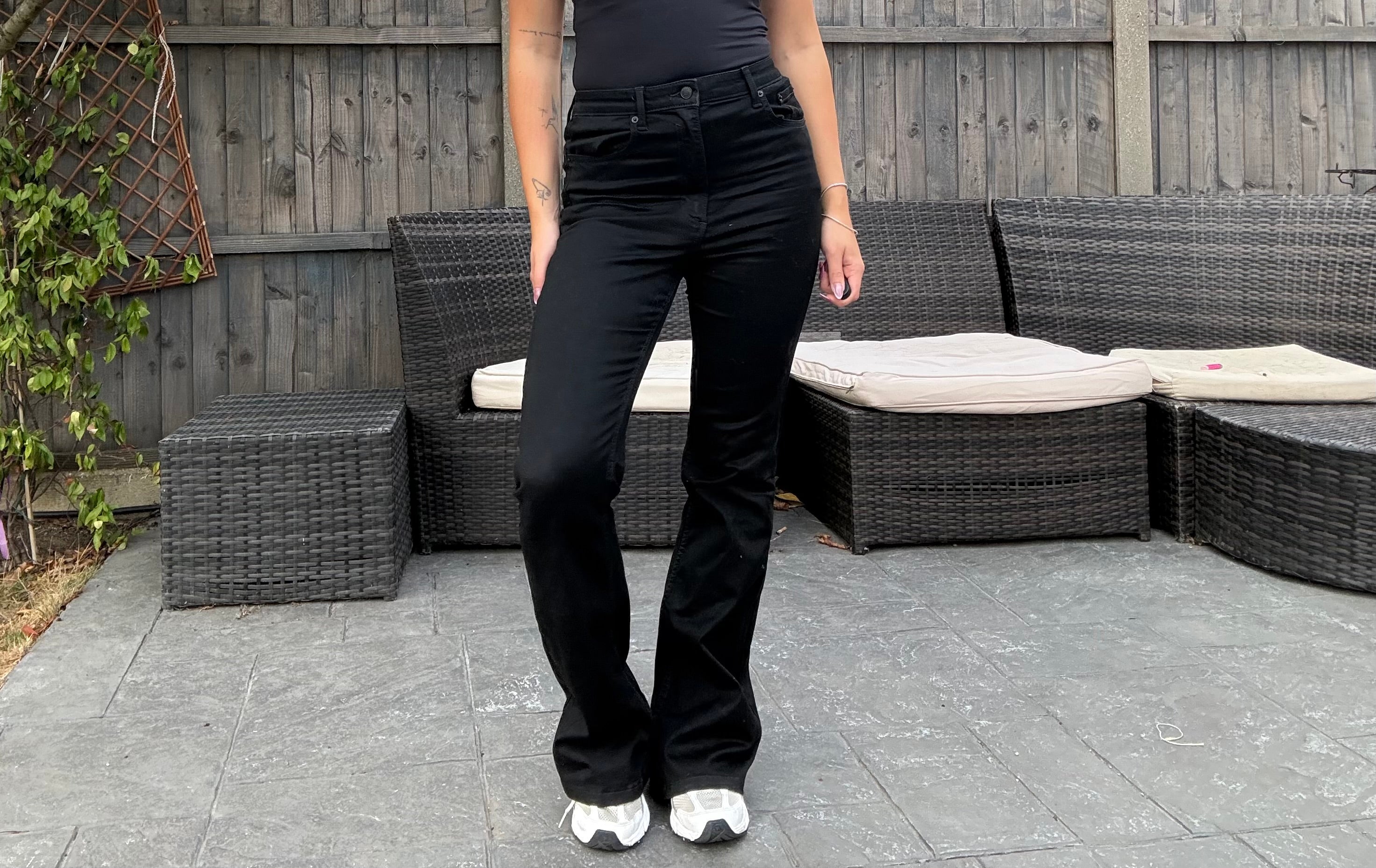 Black jeans are a staple for every autumn winter wardrobe (Isabella Howells/The Independent)