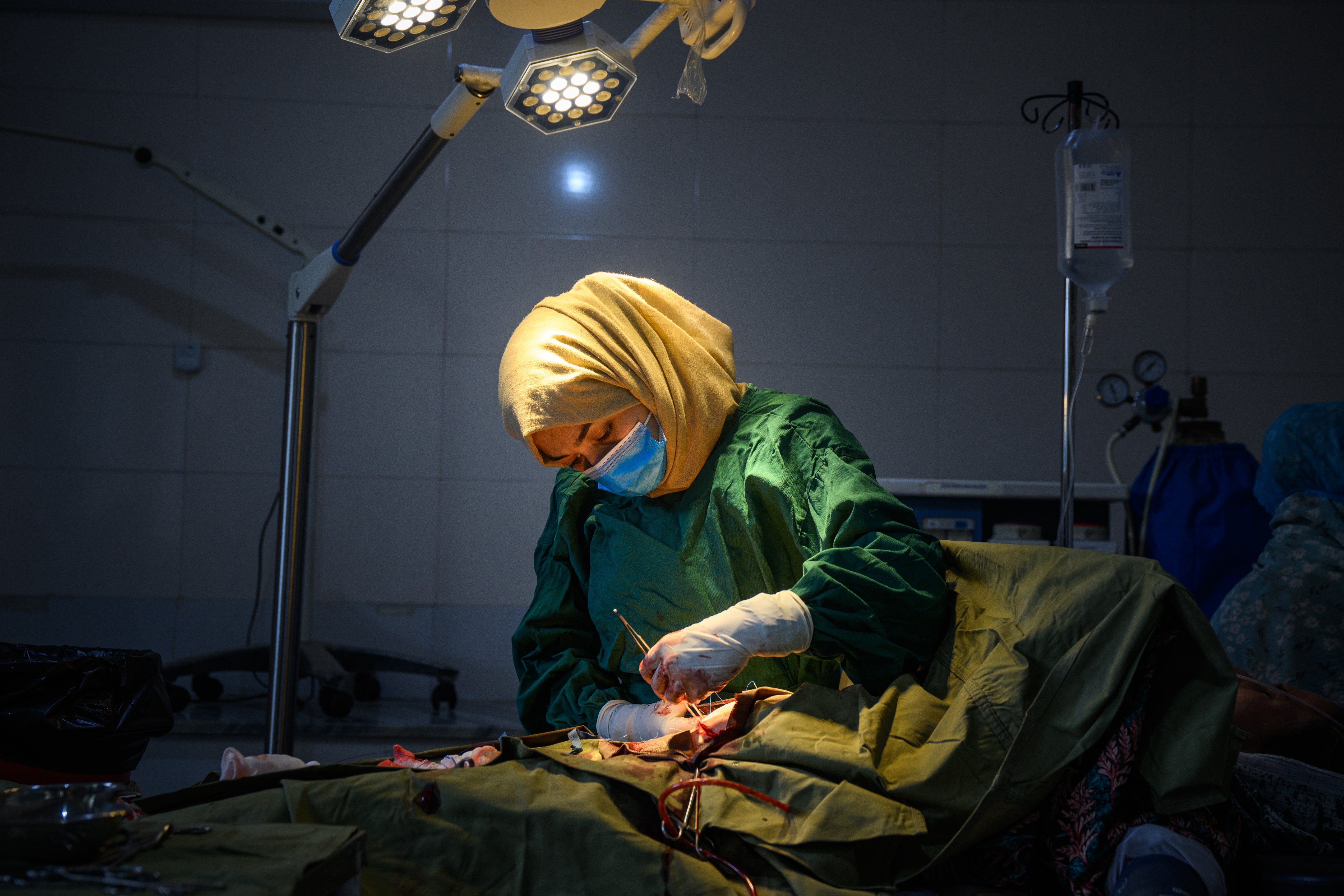 In Ghazni, Afghanistan, a provincial hospital's maternity unit has seen its caseload increase with the closures of health facilities across the province, with women coming from far away and arriving in critical states.