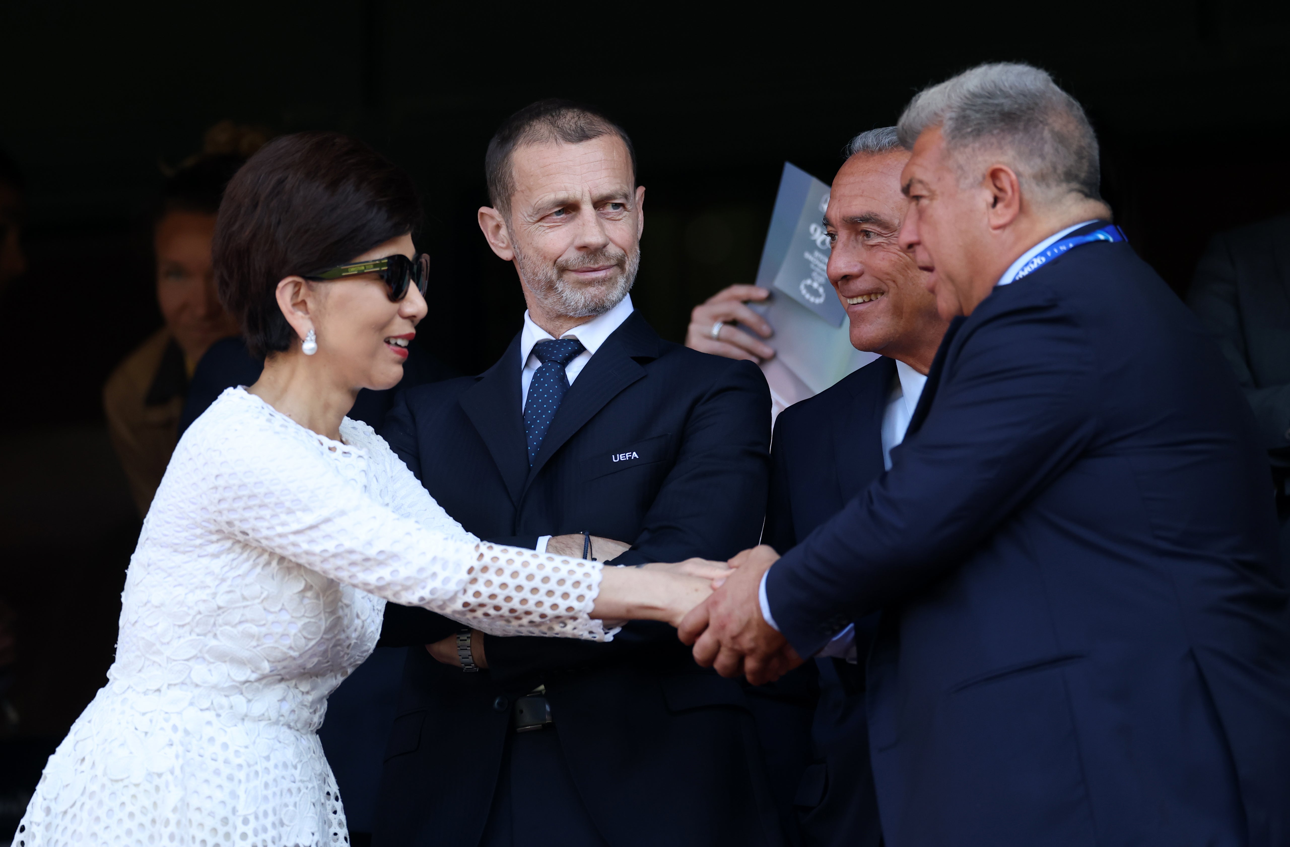 Michele Kang shaking hands with Barcelona president Joan Laporta and alongside Uefa president Aleksander Ceferin before the 2026 Women's Champions League final