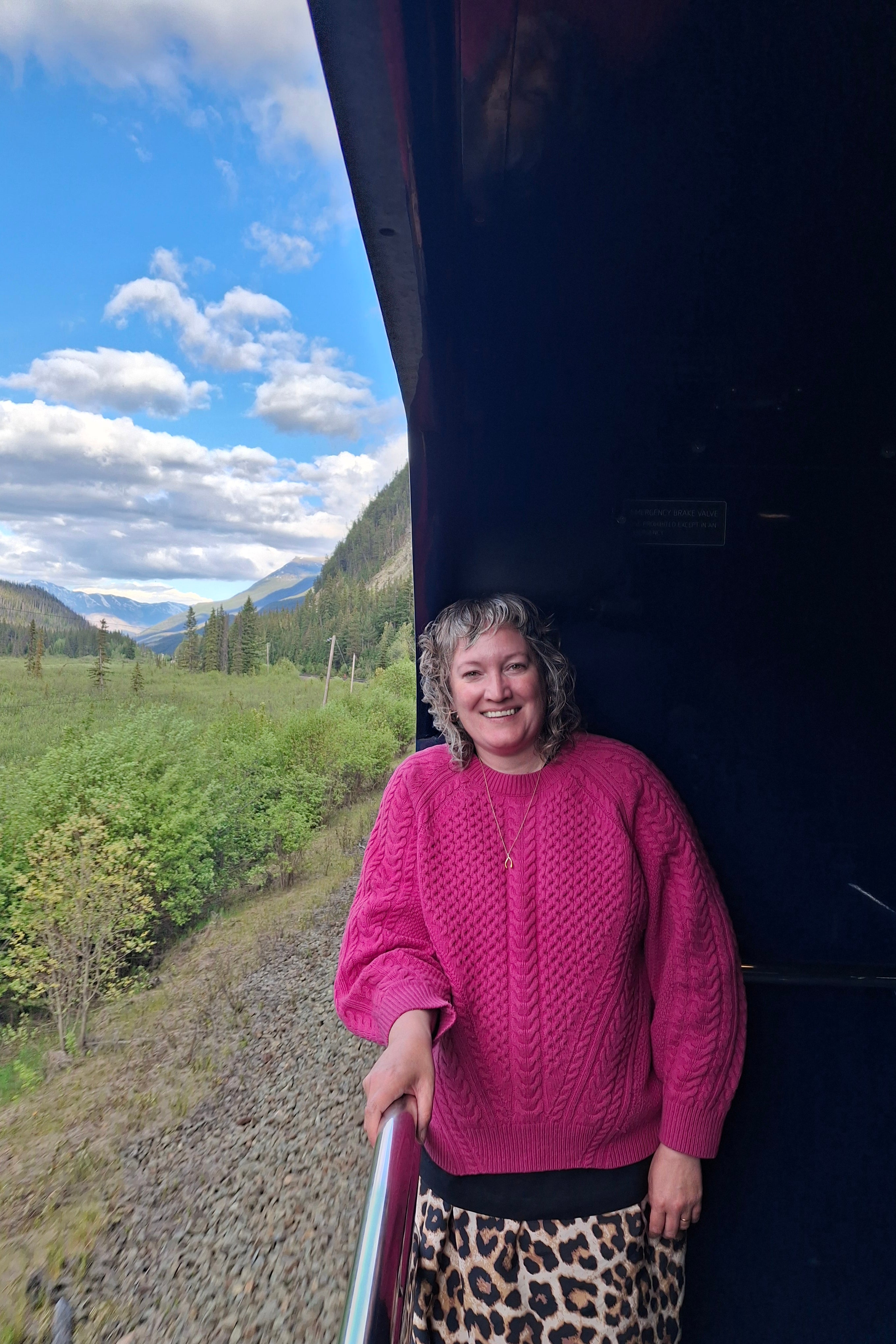 Writer Joanna Whitehead on the viewing platform of Rocky Mountaineer (Joanna Whitehead)