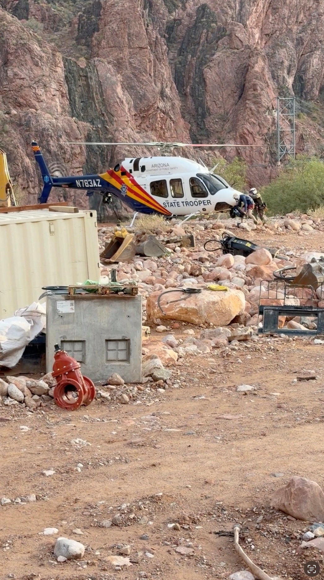 A person is evacuated after flash floods