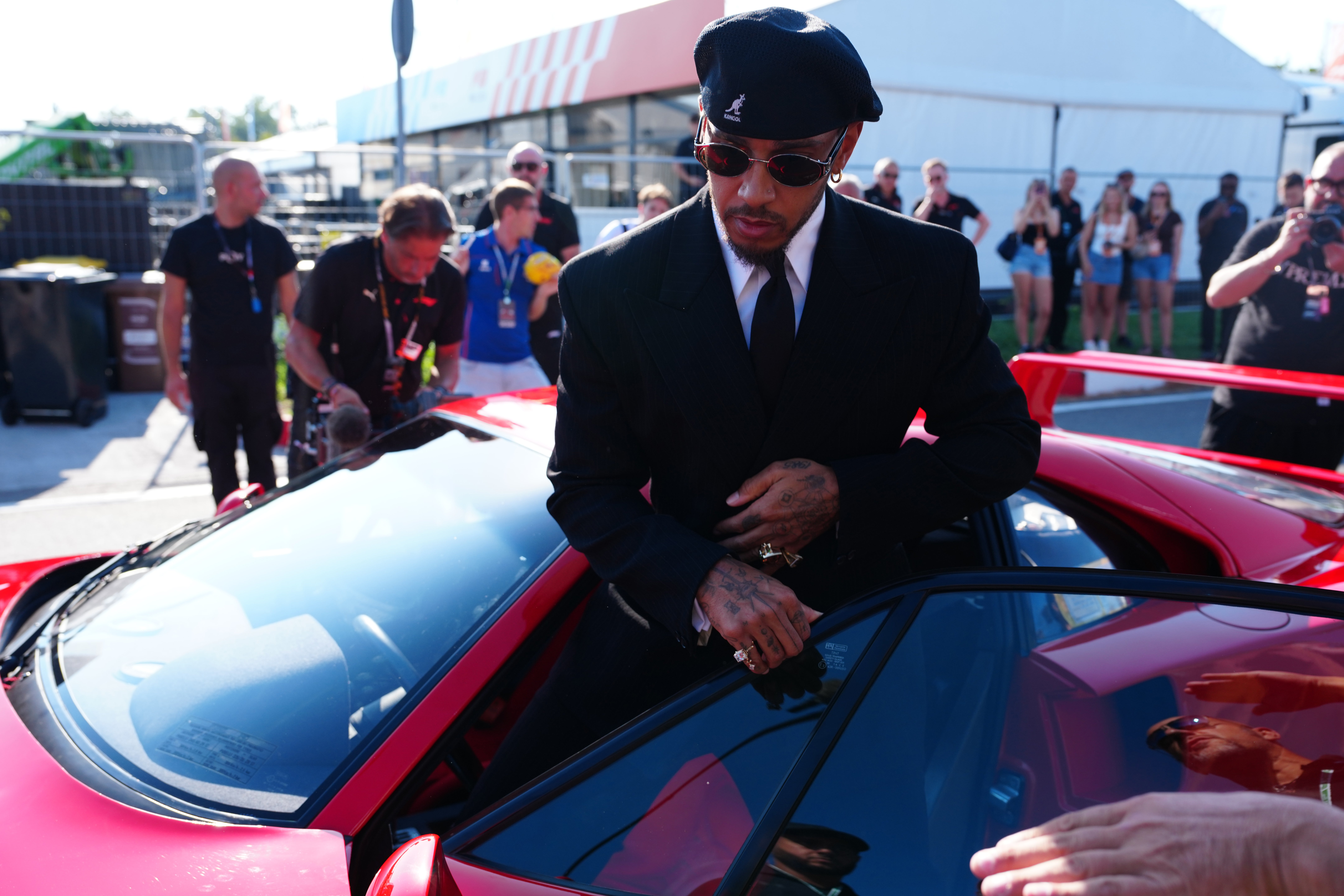 Lewis Hamilton was mobbed when he arrived in Monza on Thursday (Bradley Collyer/PA)