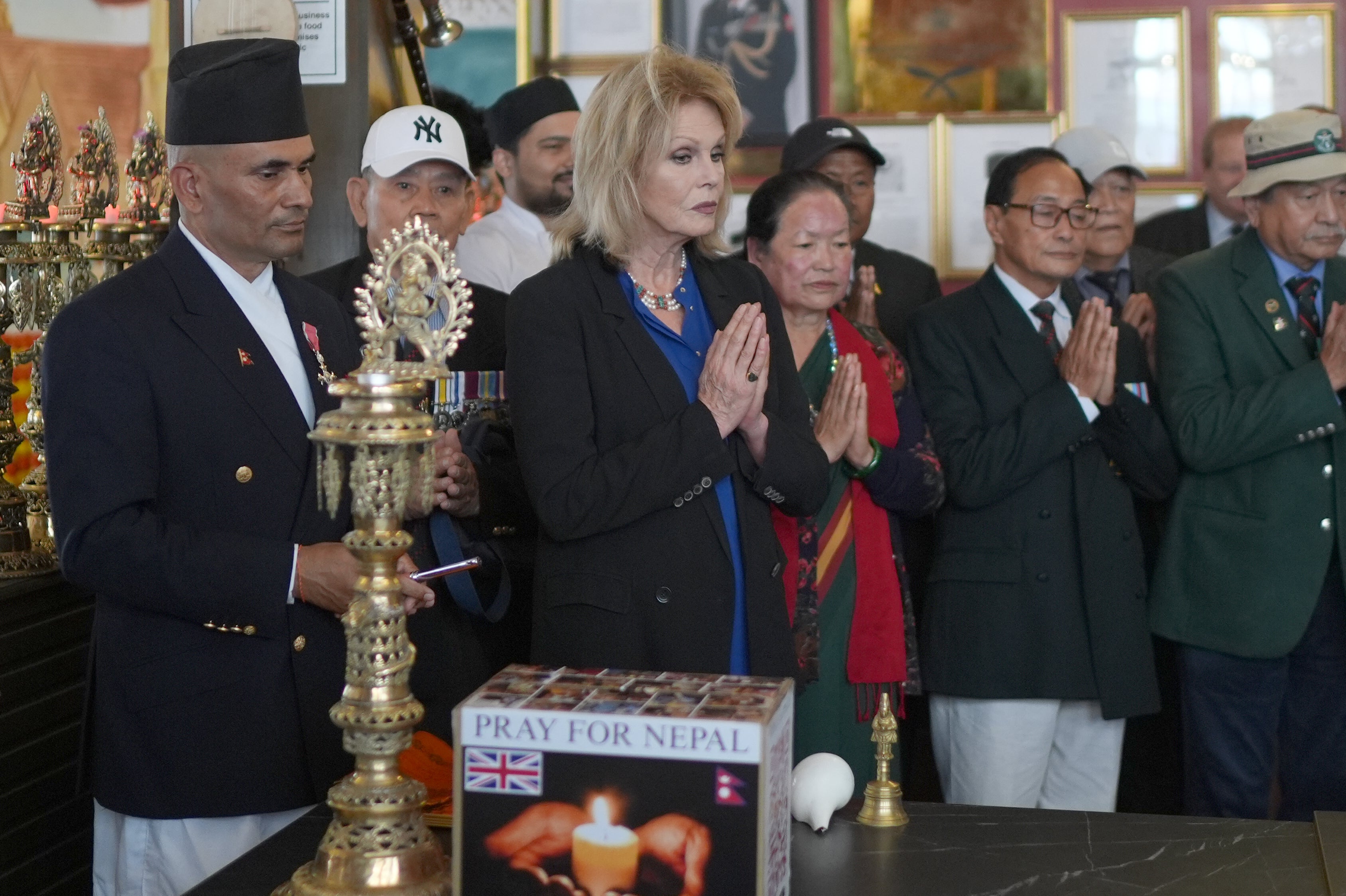 <p>Dame Joanna joined members of London’s Nepalese community for a candlelit service in London</p>