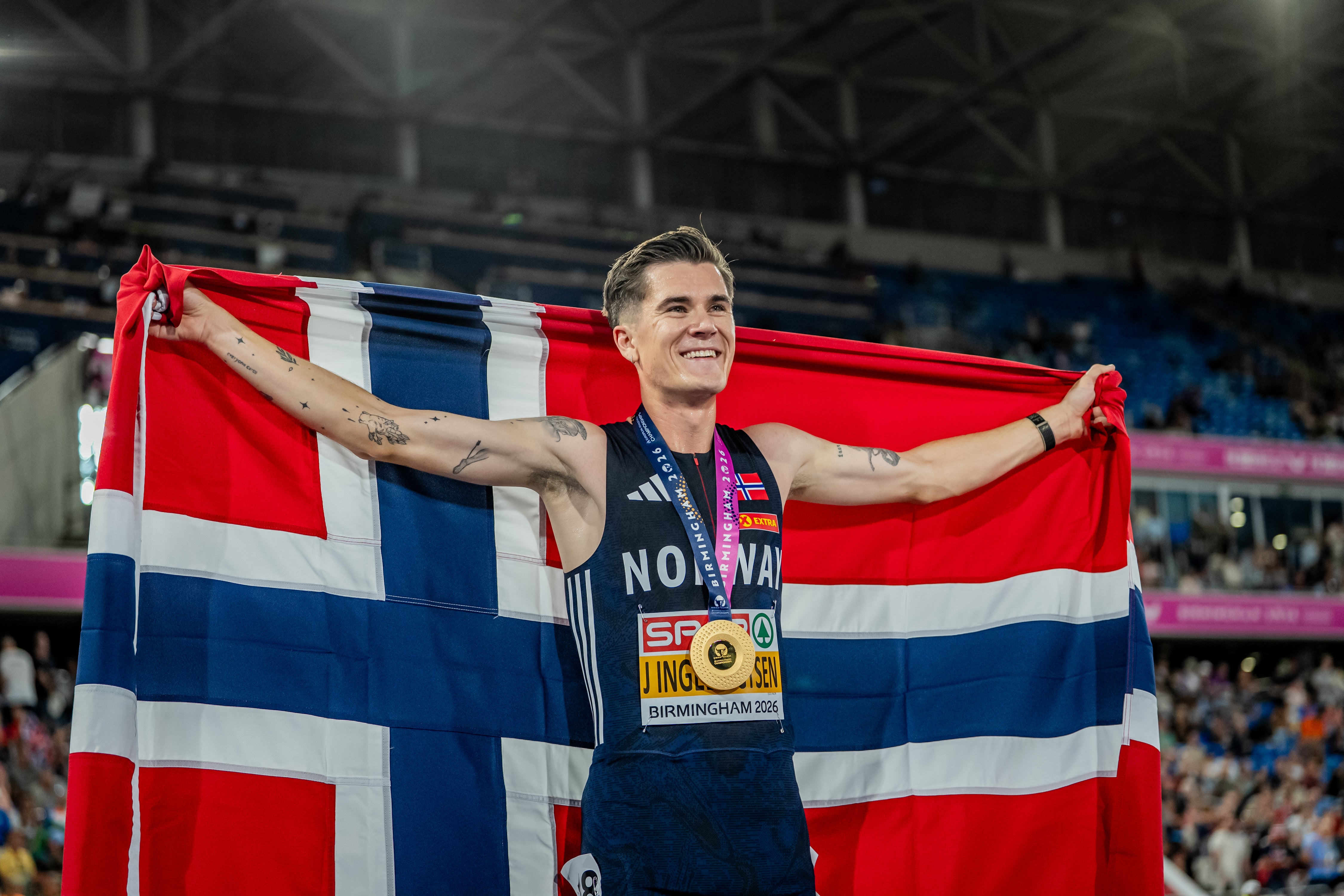 Jakob Ingebrigtsen celebrates winning the Men's 5000m in the European Championships in Birmingham