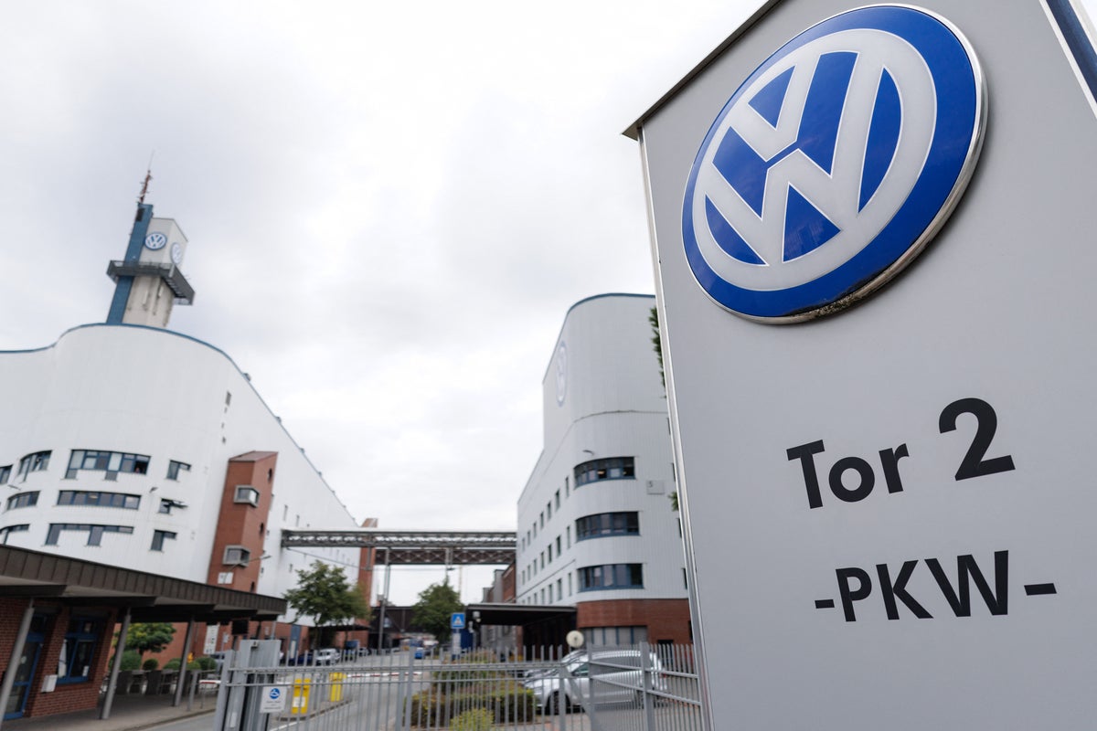 Volkswagen board approves cutting 50,000 more jobs and closing 4 plants