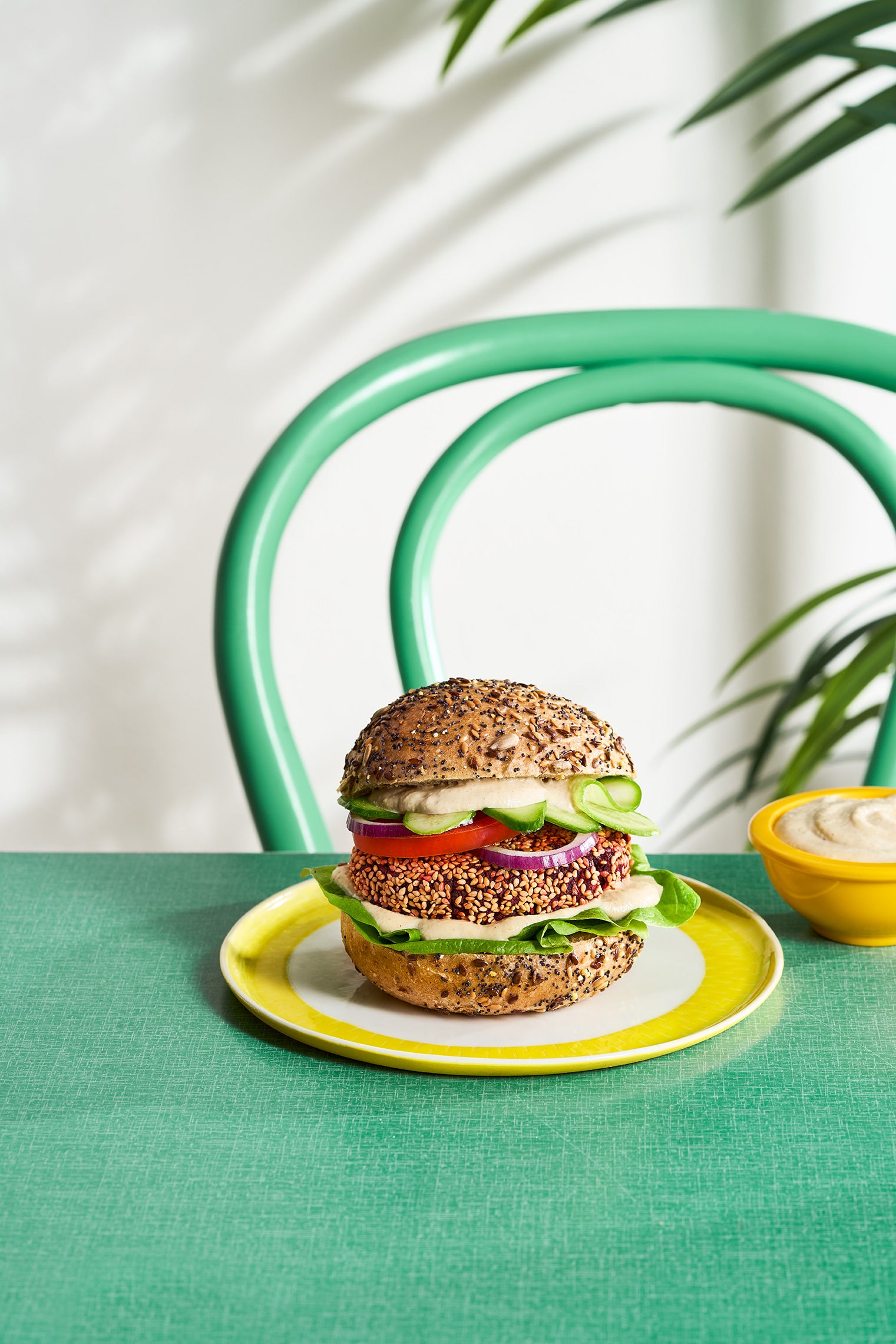 Beetroot, chickpeas and tahini turn the usual veggie burger into something rather more colourful