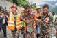 Two men rescued after faint voices heard coming from hydropower tunnel nine days after Nepal floods