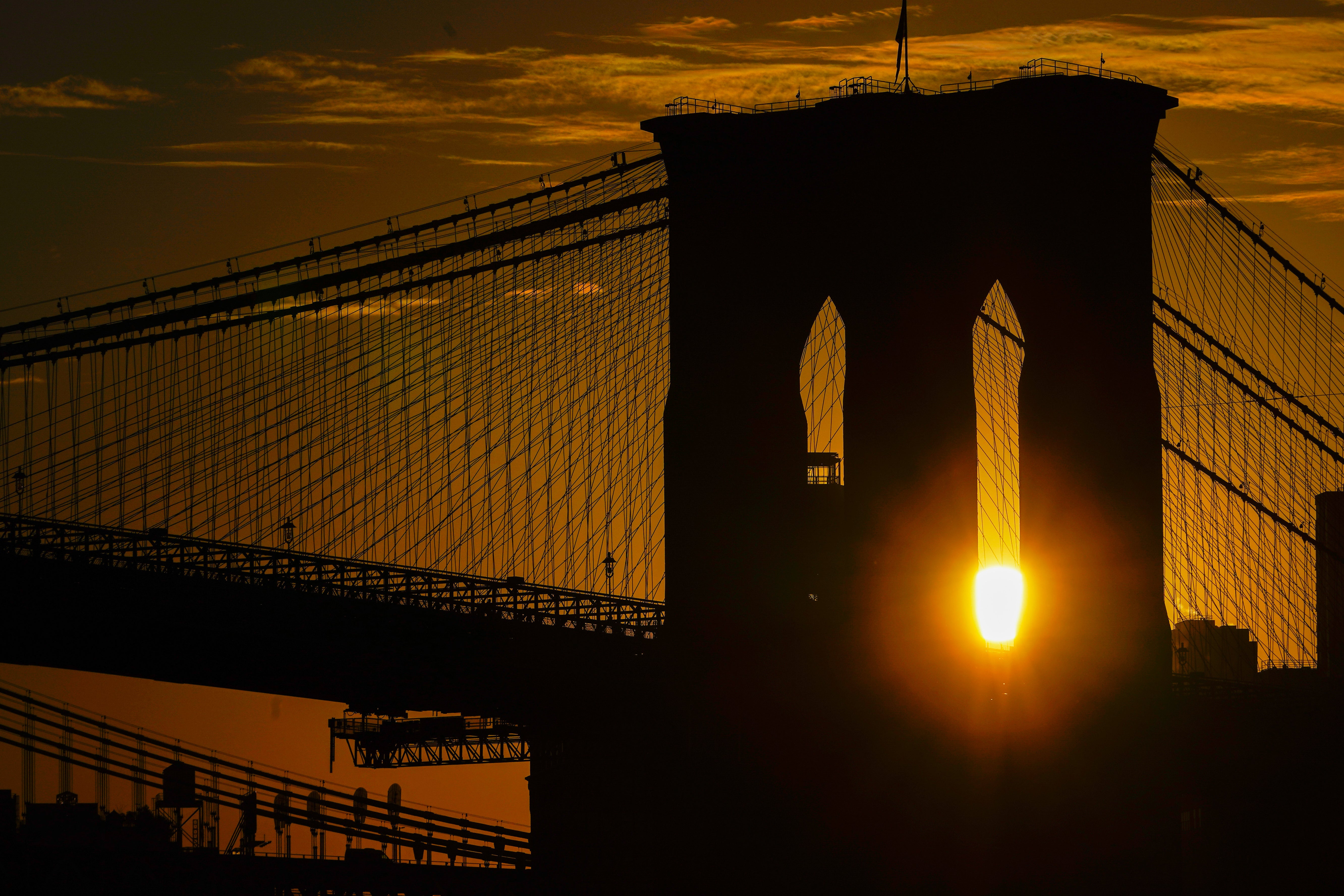 Police tried to de-escalate the situation and urged the man not to jump, city officials said