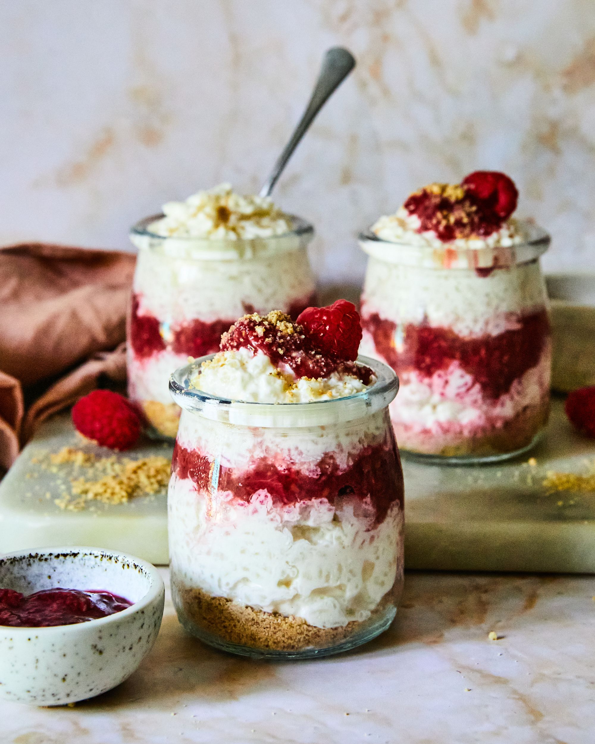Sushi rice gets a sweet makeover with raspberries, cream cheese and biscuit crumb