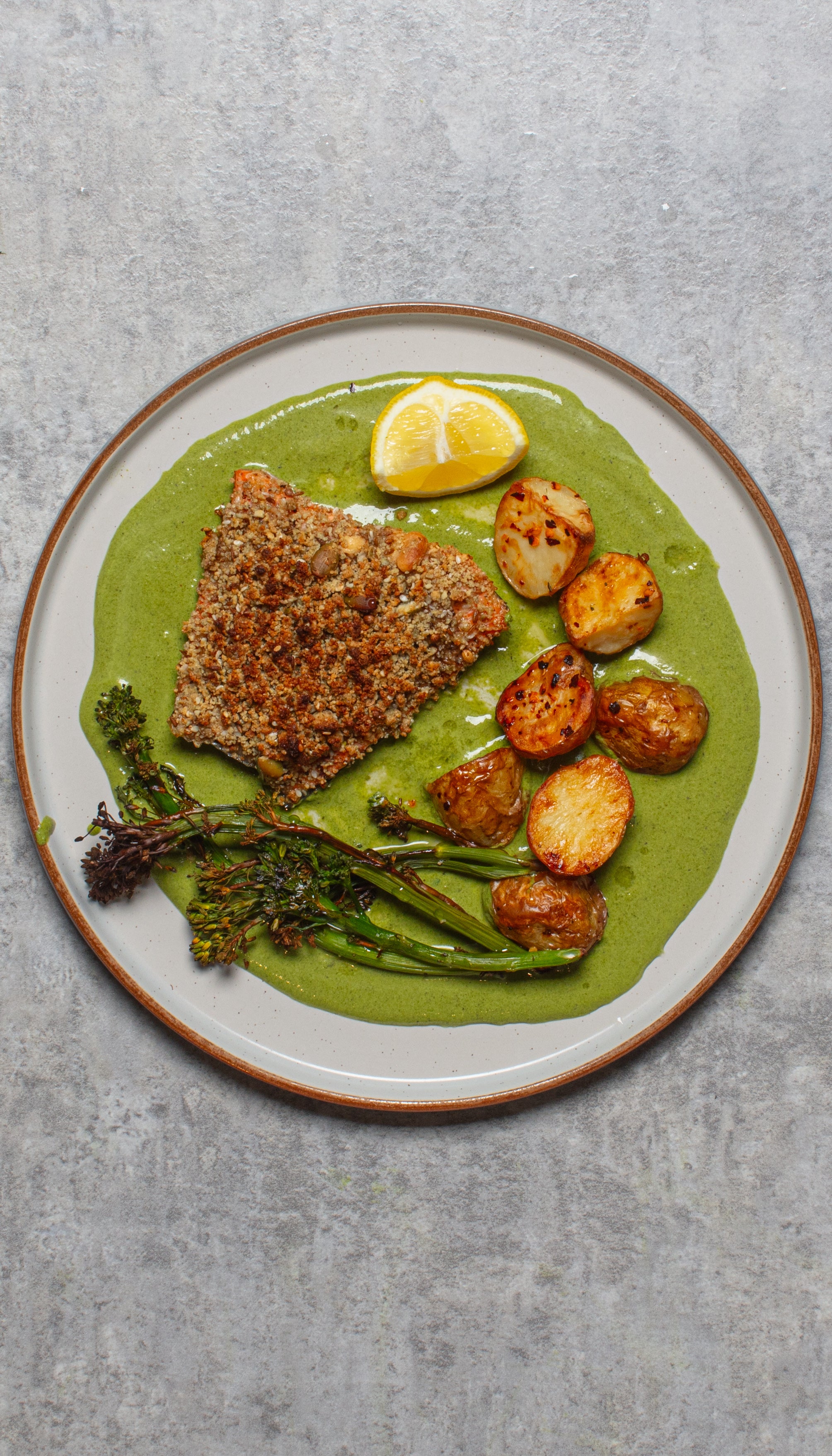A crunchy seed and peanut crust meets a cooling coriander yoghurt dressing