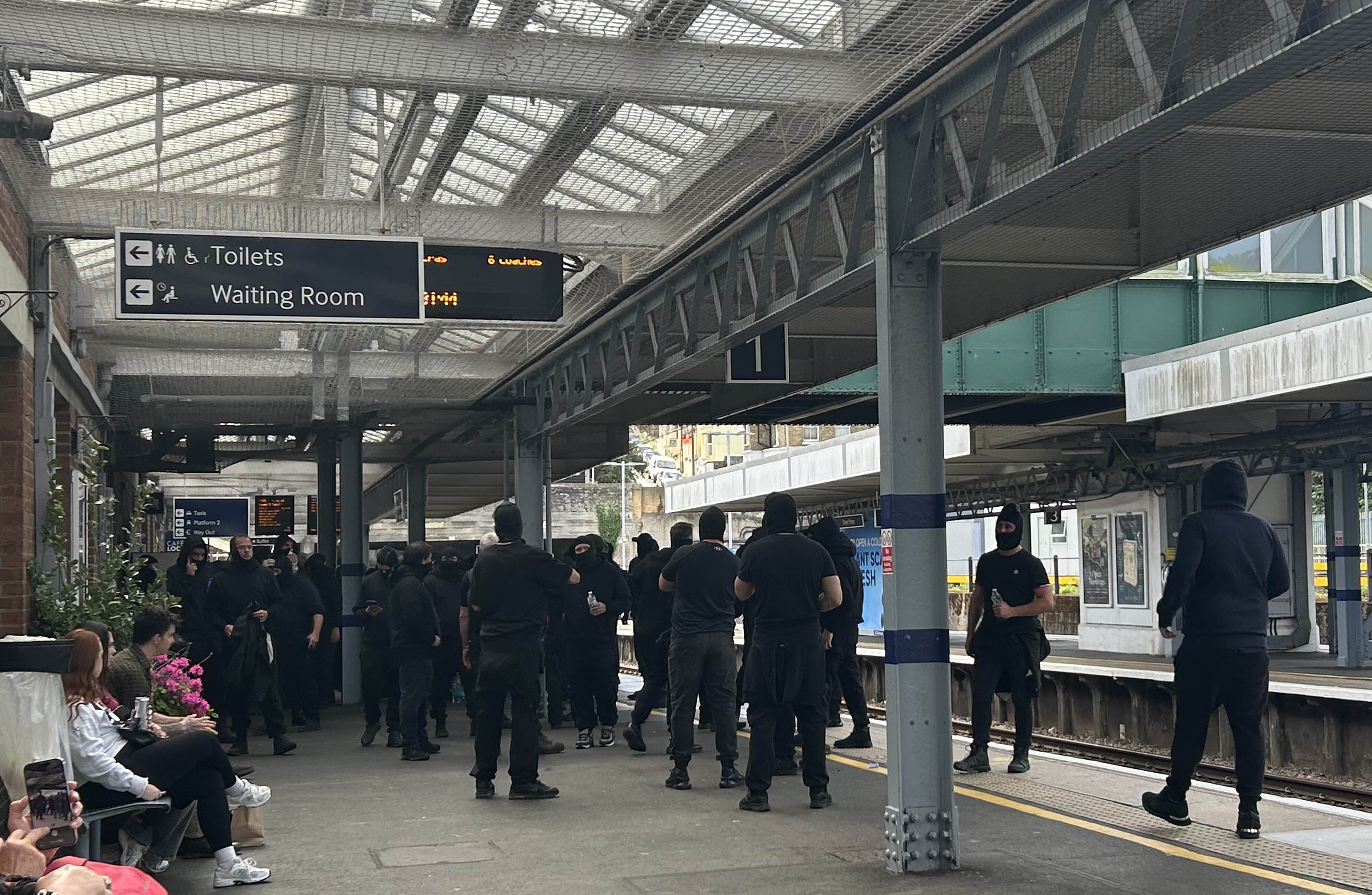 Protesters at Dover Priory train station (Oscar Rihill/PA)