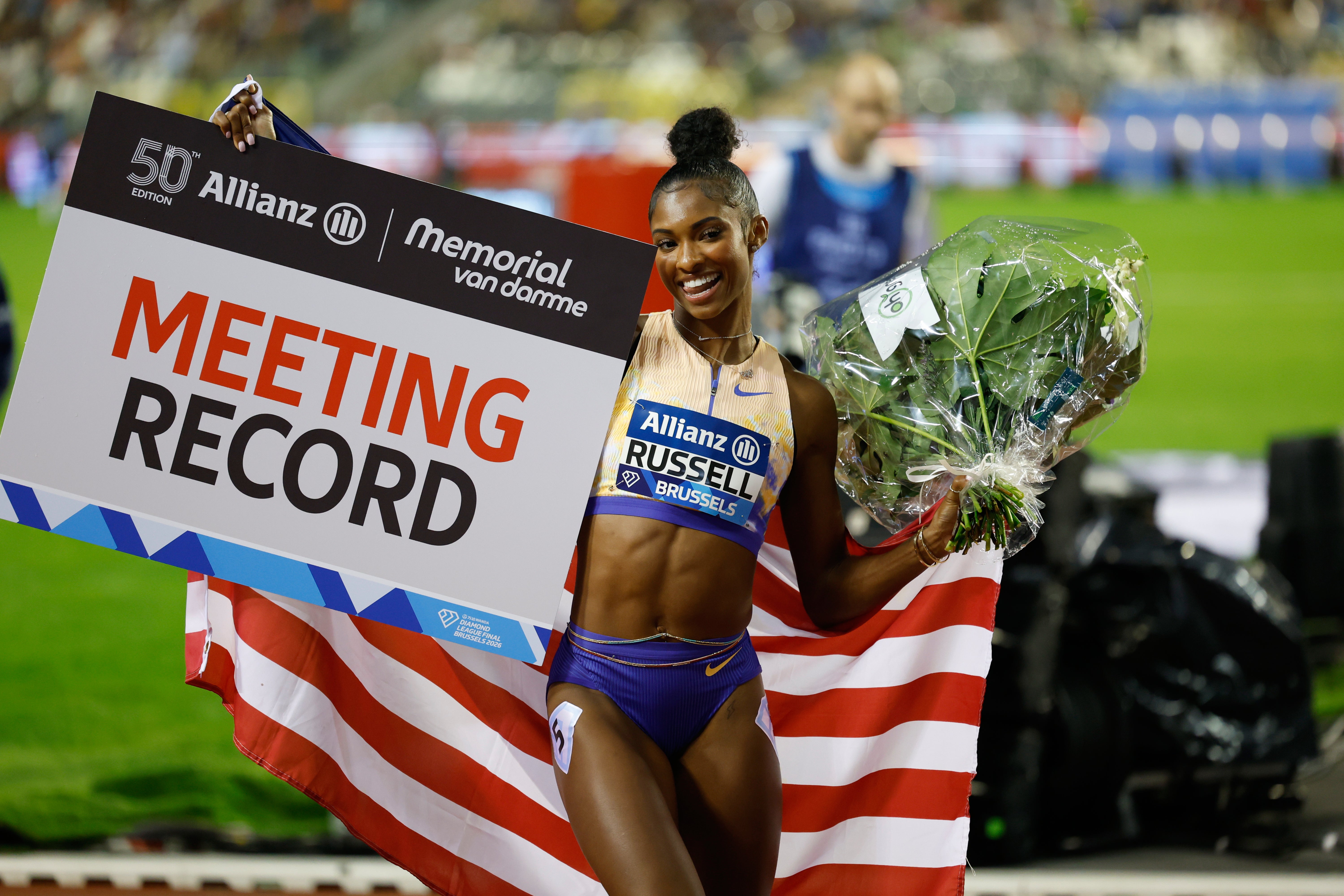 Masai Russell set a new meeting record but was made to work for it by Devynne Charlton
