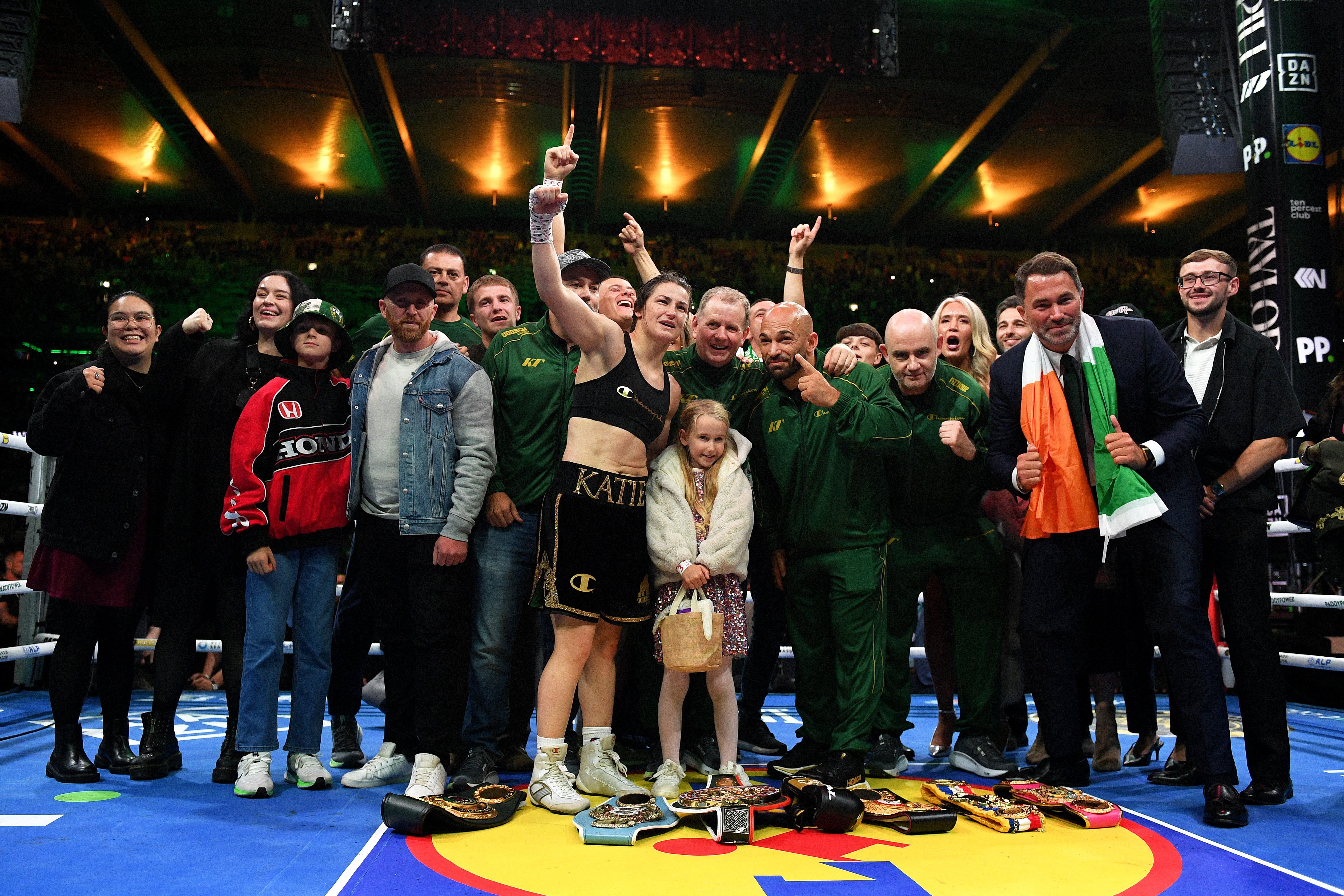 Taylor celebrates with her family and team