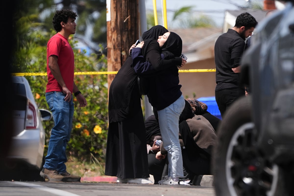 Parents of San Diego mosque gunman say a mental health facility failed to heed FBI warning