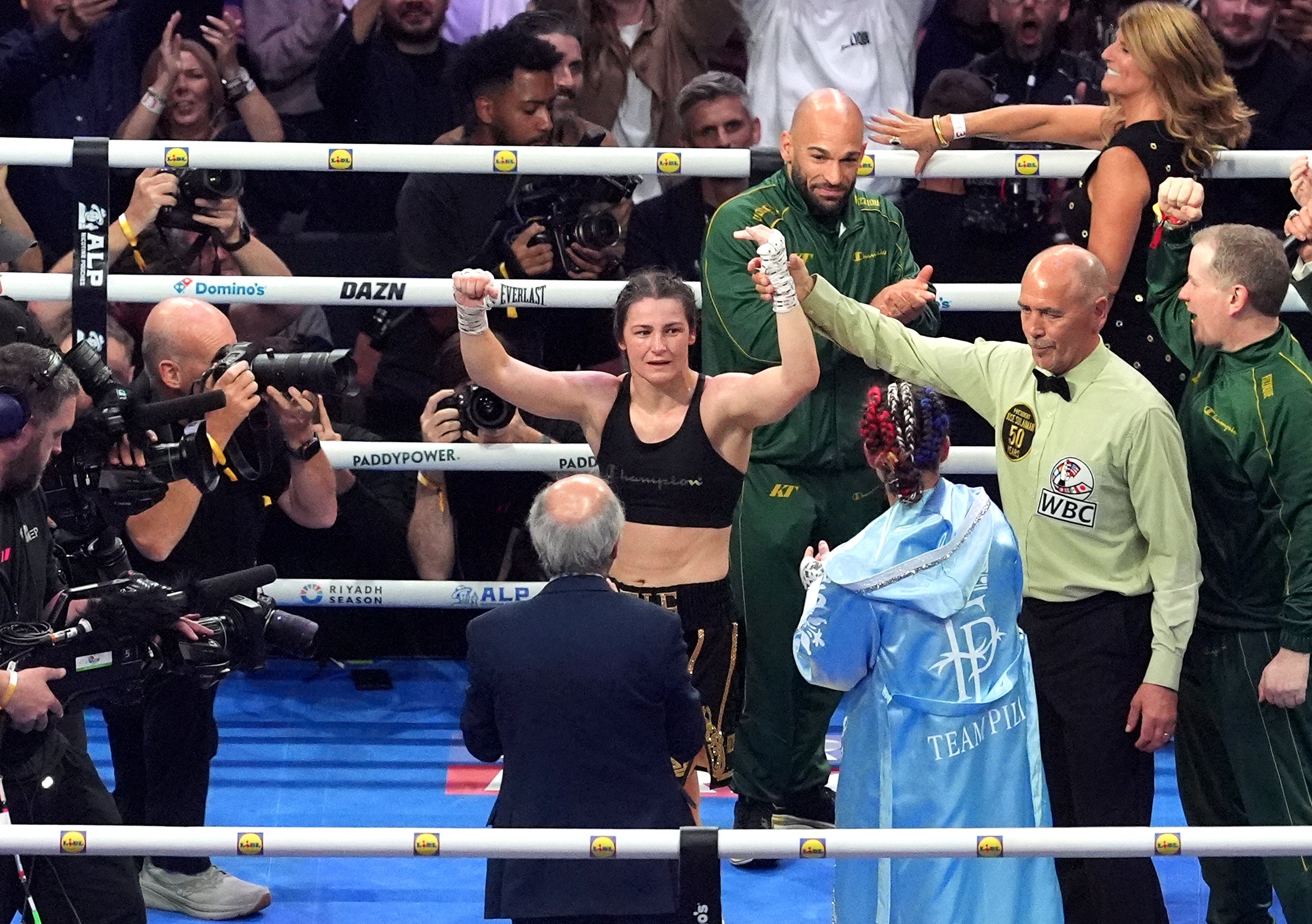 Katie Taylor is announced as the winner of her final fight (Brian Lawless/PA)