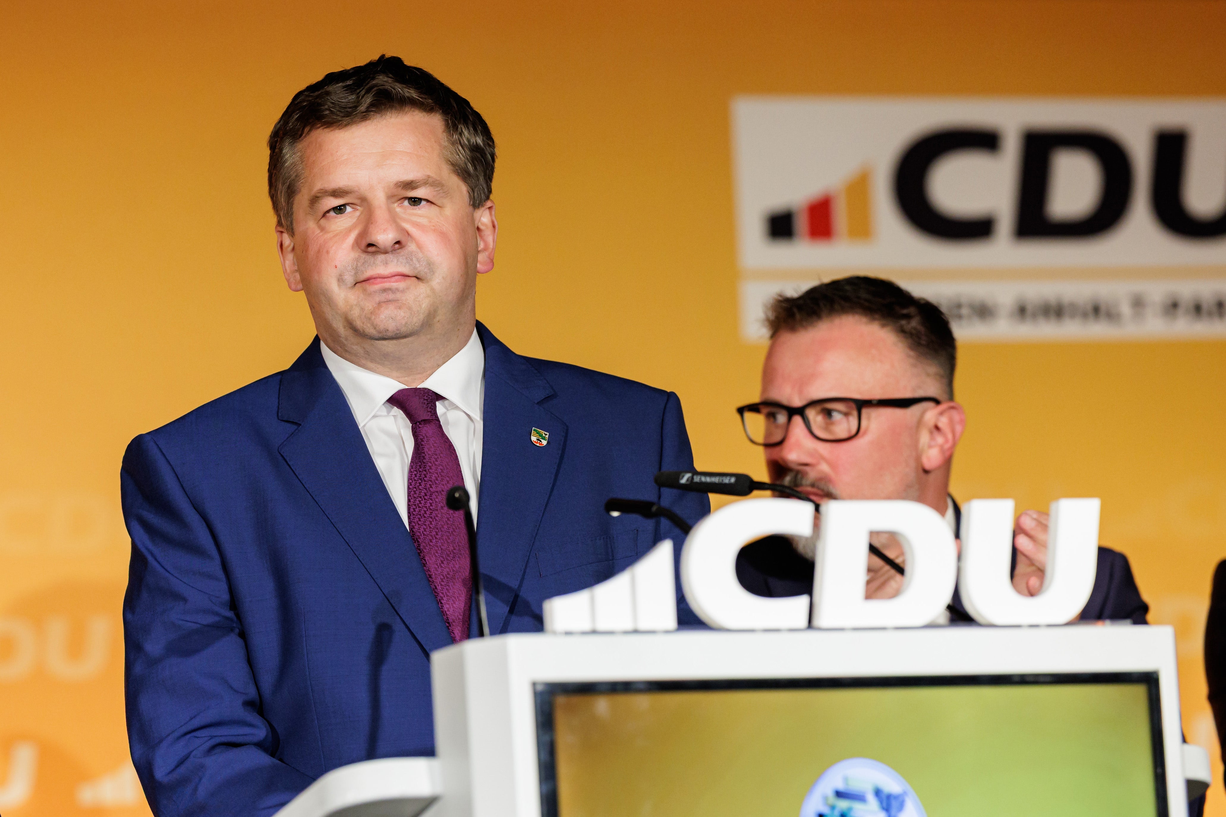 Sven Schulze, premier of Saxony-Anhalt and member of the German Christian Democratic Union (CDU) reacts to initial results in Saxony-Anhalt state elections following the closure of polling stations