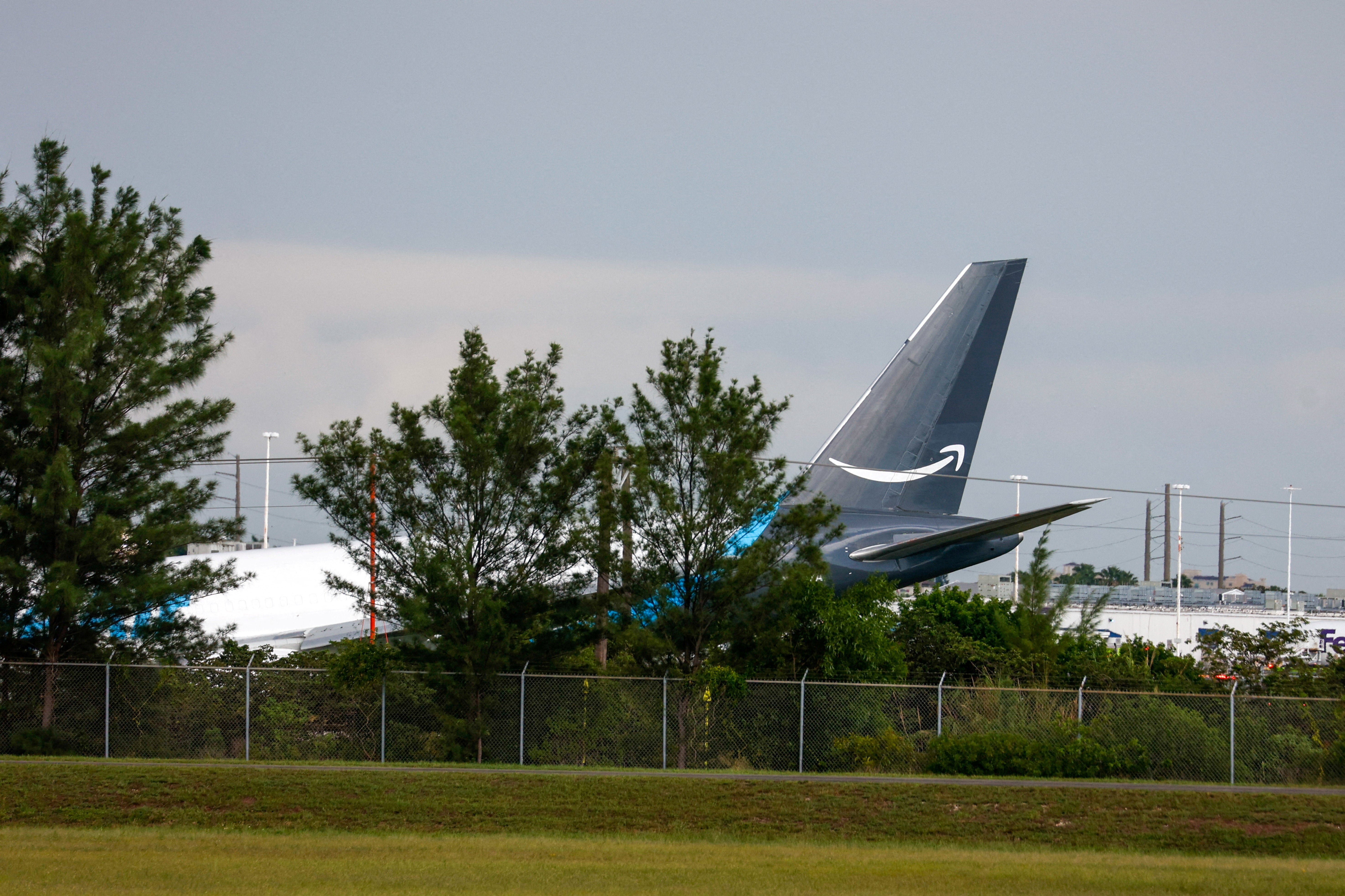The Amazon cargo plane that airport officials said overran a runway at Miami International Airport
