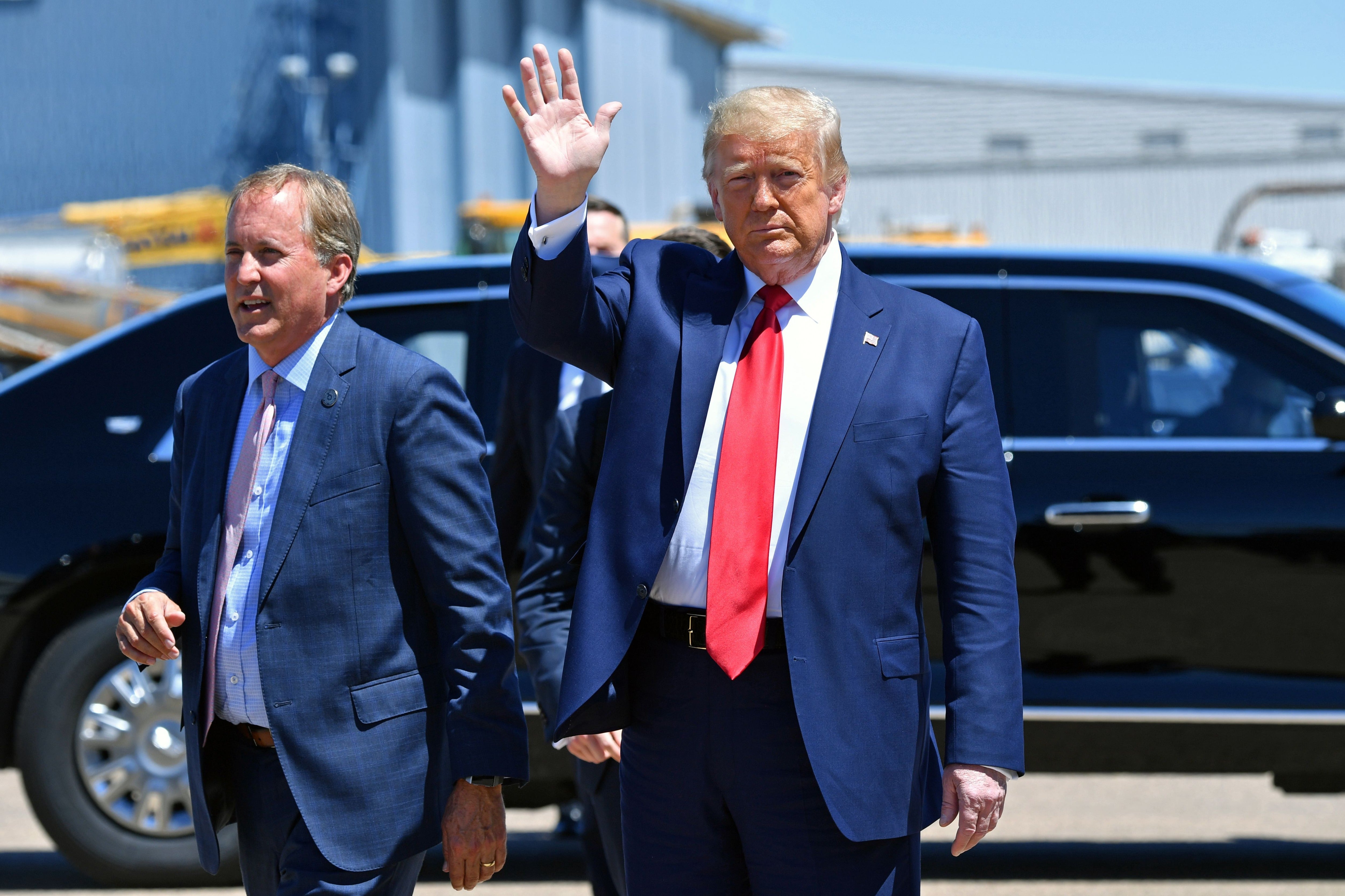 Ken Paxton with Donald Trump in Dallas, Texas, in June 2020. Paxton won his primary despite facing a major cash disadvantage