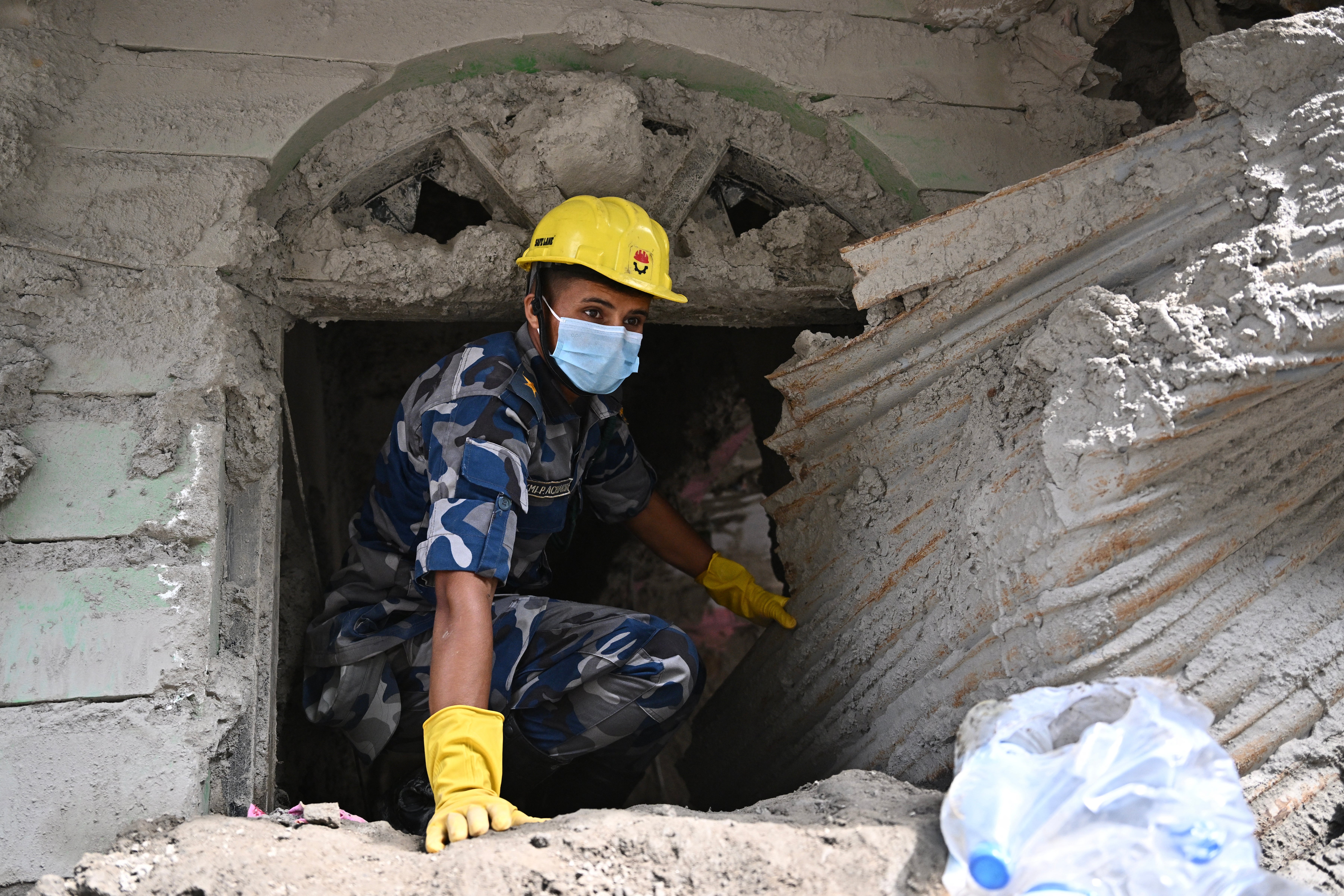 Police personnel conduct a rescue and search operation in the aftermath of flash floods at Trishuli in Nepal's Nuwakot district on 7 September 2026