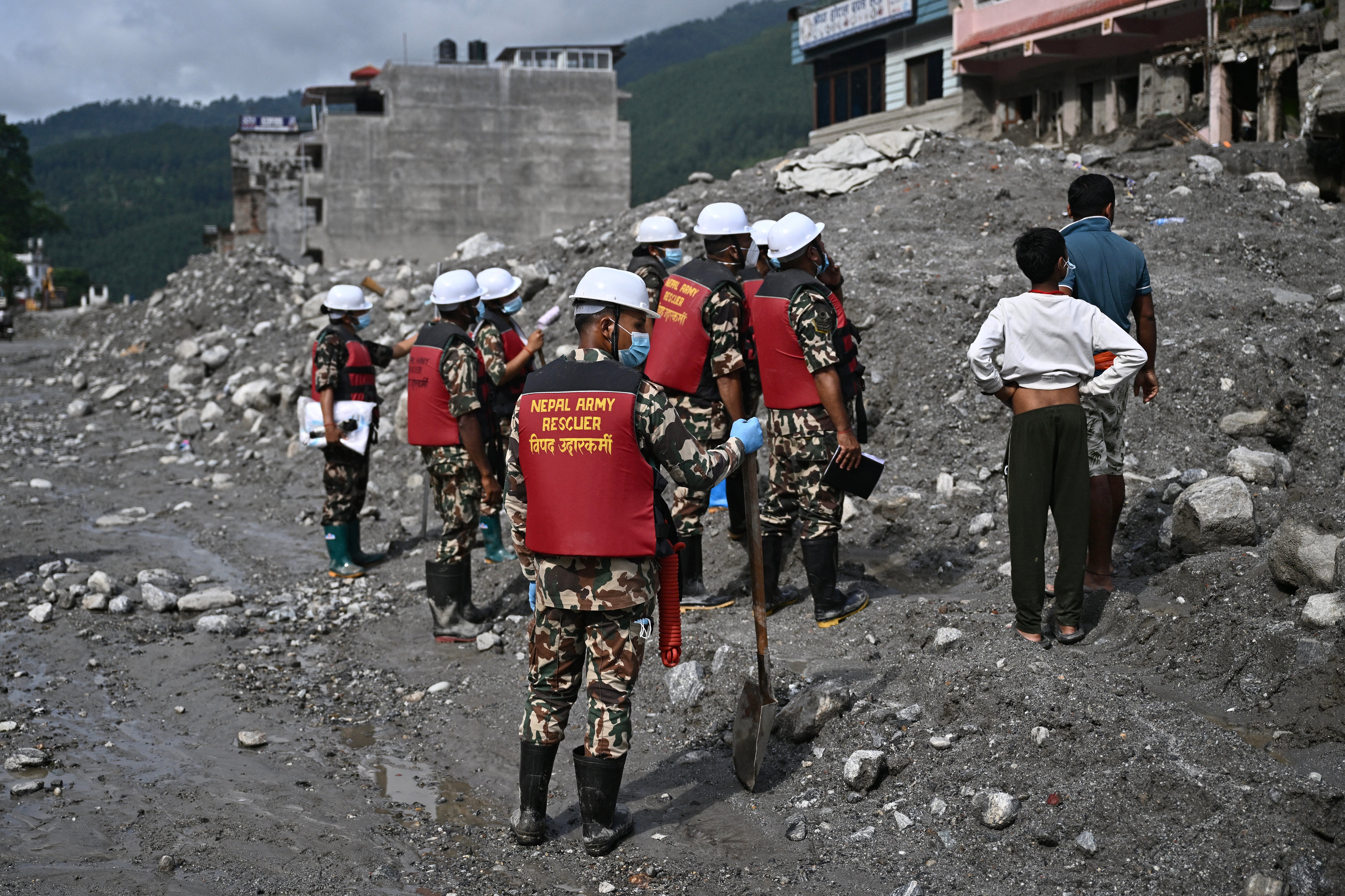 Army personnel conduct a search and rescue operation in the aftermath of flash floods at Trishuli in Nepal's Nuwakot district on 7 September 2026