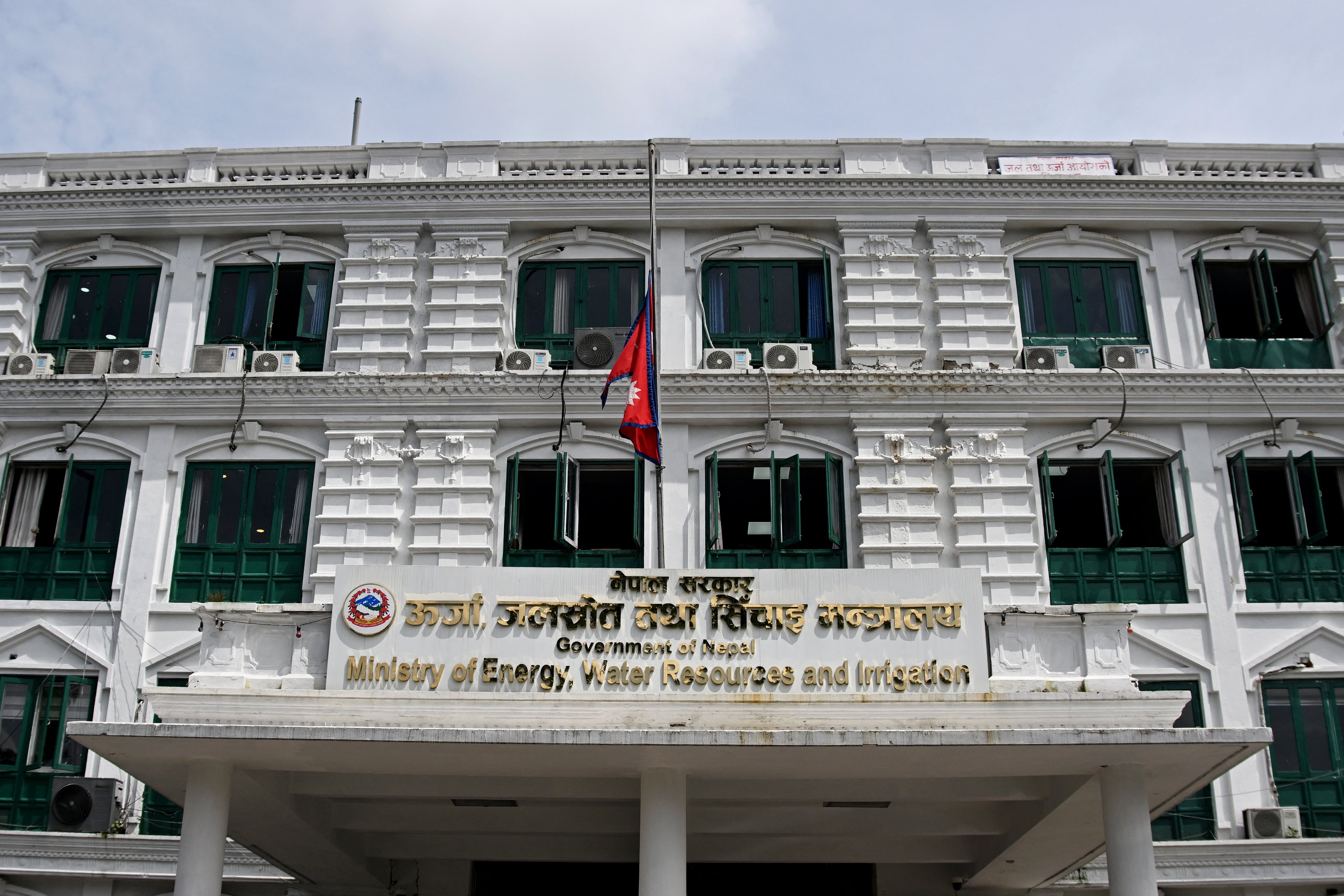 Nepal's national flag flies at half-mast as the country observes a national day of mourning in the aftermath of flash floods in Kathmandu on 7 September 2026